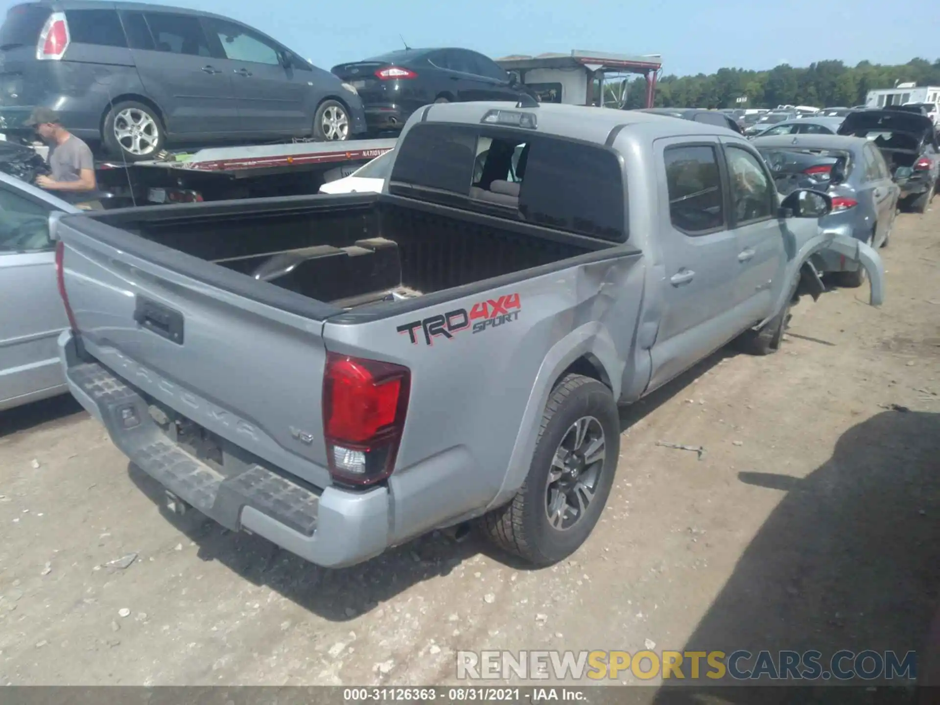 4 Photograph of a damaged car 5TFCZ5ANXKX187042 TOYOTA TACOMA 4WD 2019