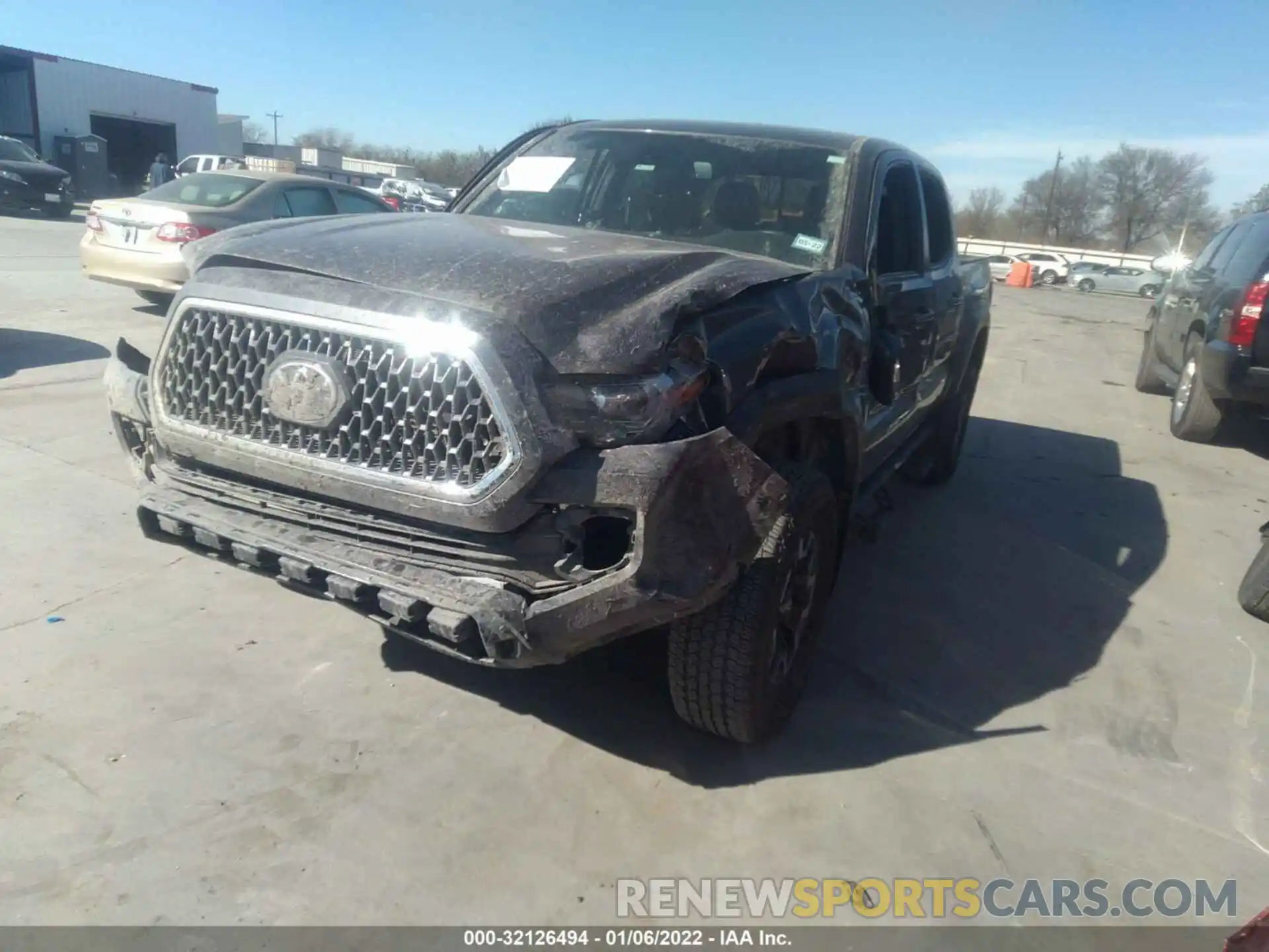 2 Photograph of a damaged car 5TFCZ5ANXKX194380 TOYOTA TACOMA 4WD 2019