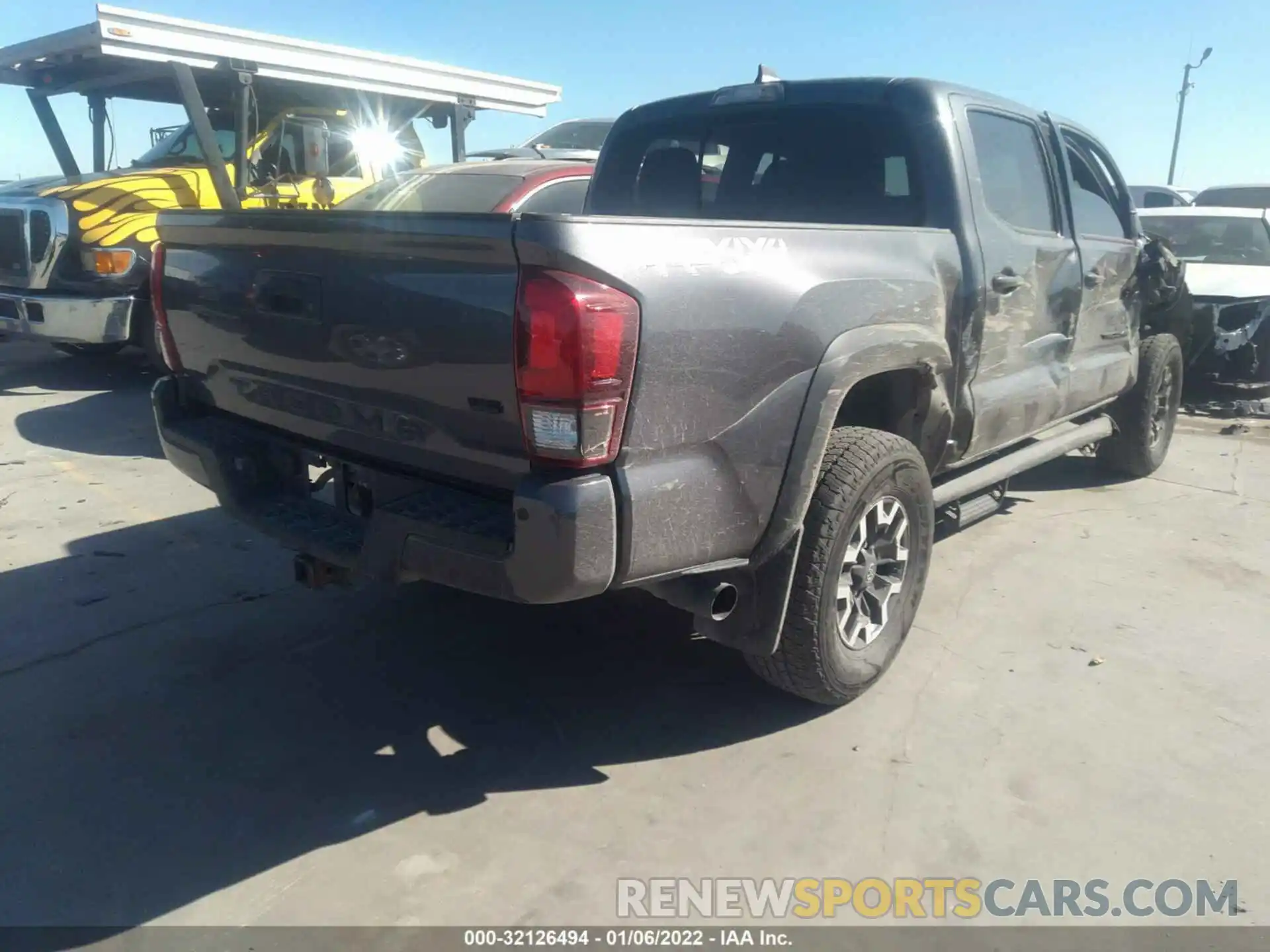 4 Photograph of a damaged car 5TFCZ5ANXKX194380 TOYOTA TACOMA 4WD 2019