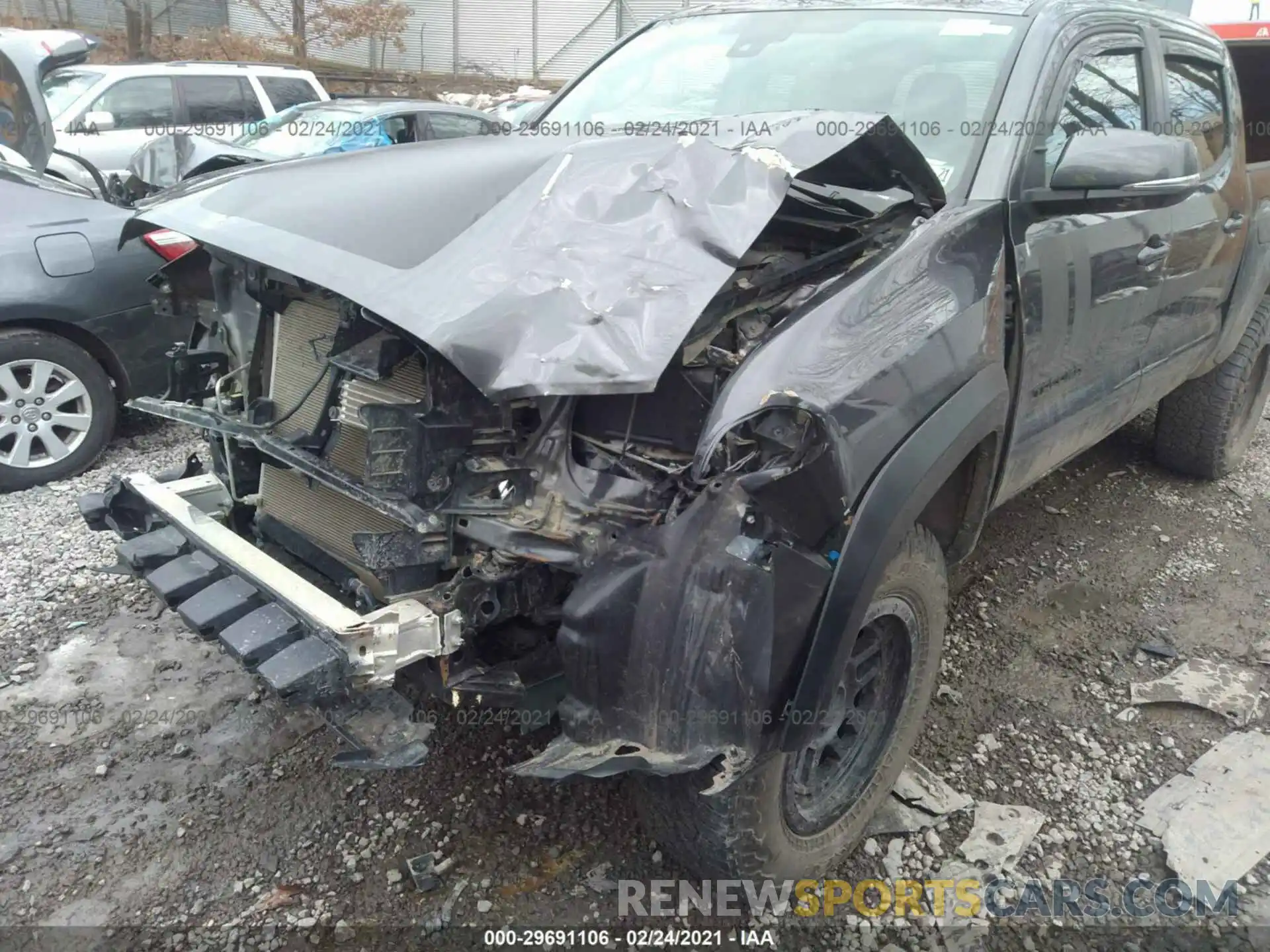 6 Photograph of a damaged car 5TFCZ5ANXKX210321 TOYOTA TACOMA 4WD 2019