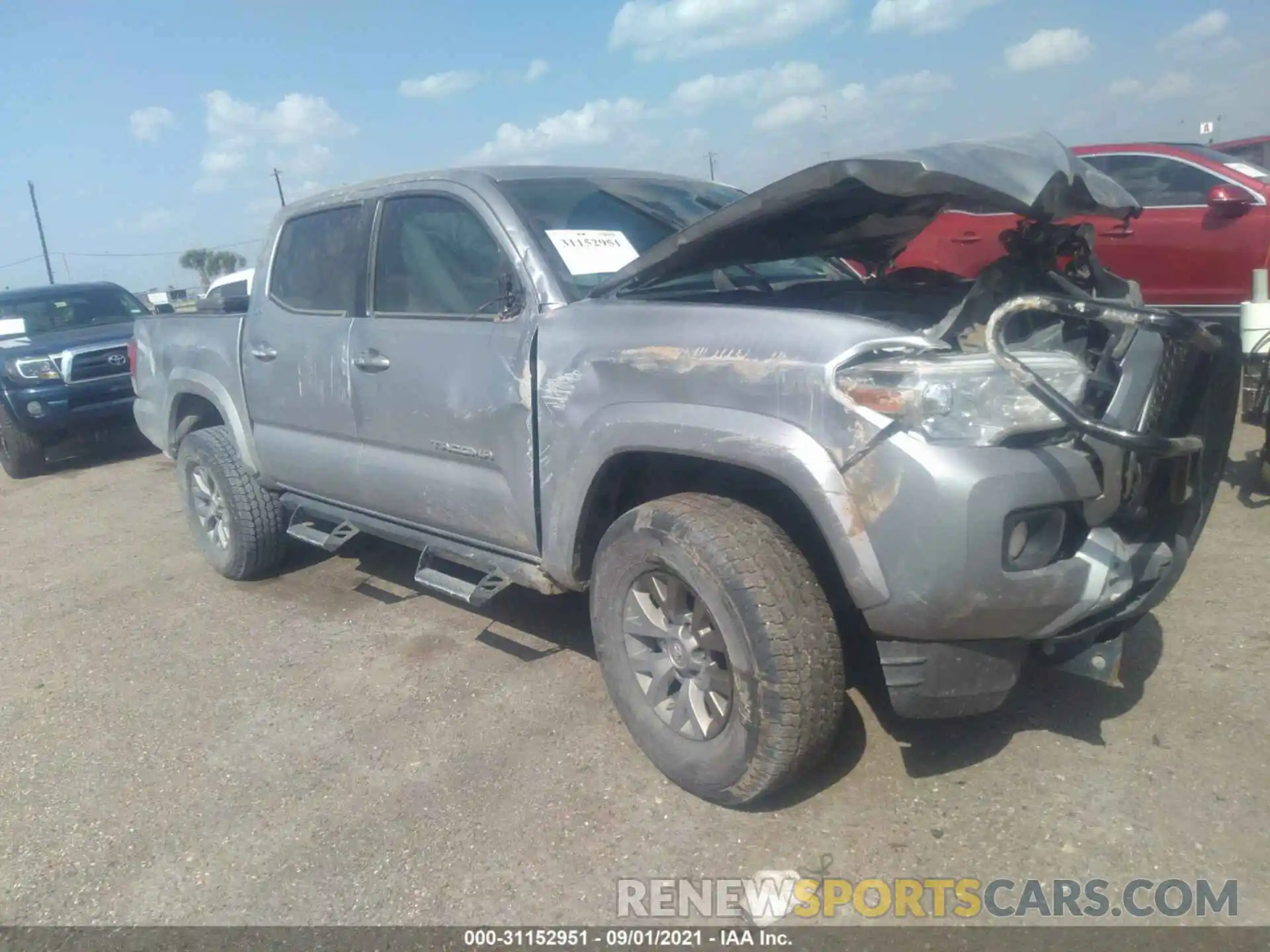 1 Photograph of a damaged car 5TFCZ5ANXKX210822 TOYOTA TACOMA 4WD 2019