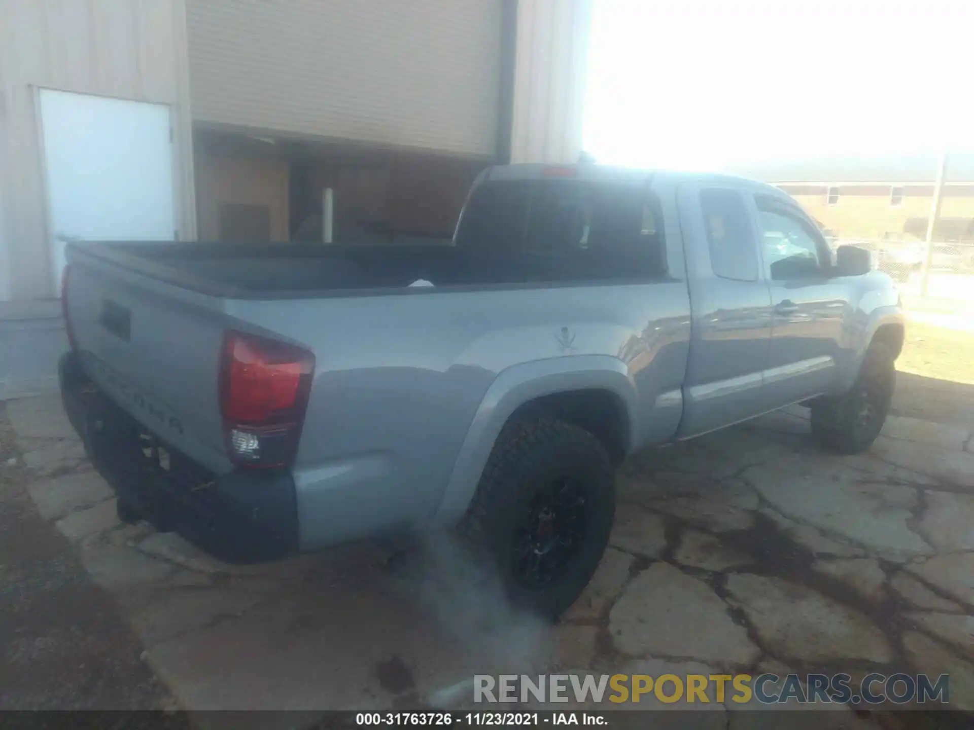 4 Photograph of a damaged car 5TFSZ5AN1KX185059 TOYOTA TACOMA 4WD 2019