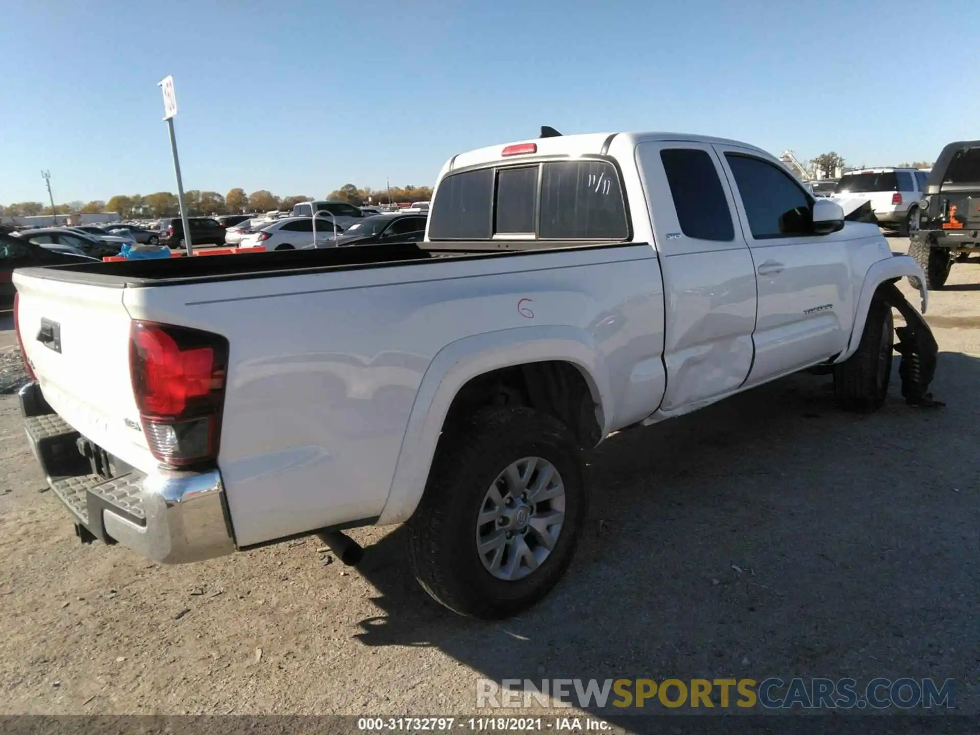 4 Photograph of a damaged car 5TFSZ5AN2KX171882 TOYOTA TACOMA 4WD 2019