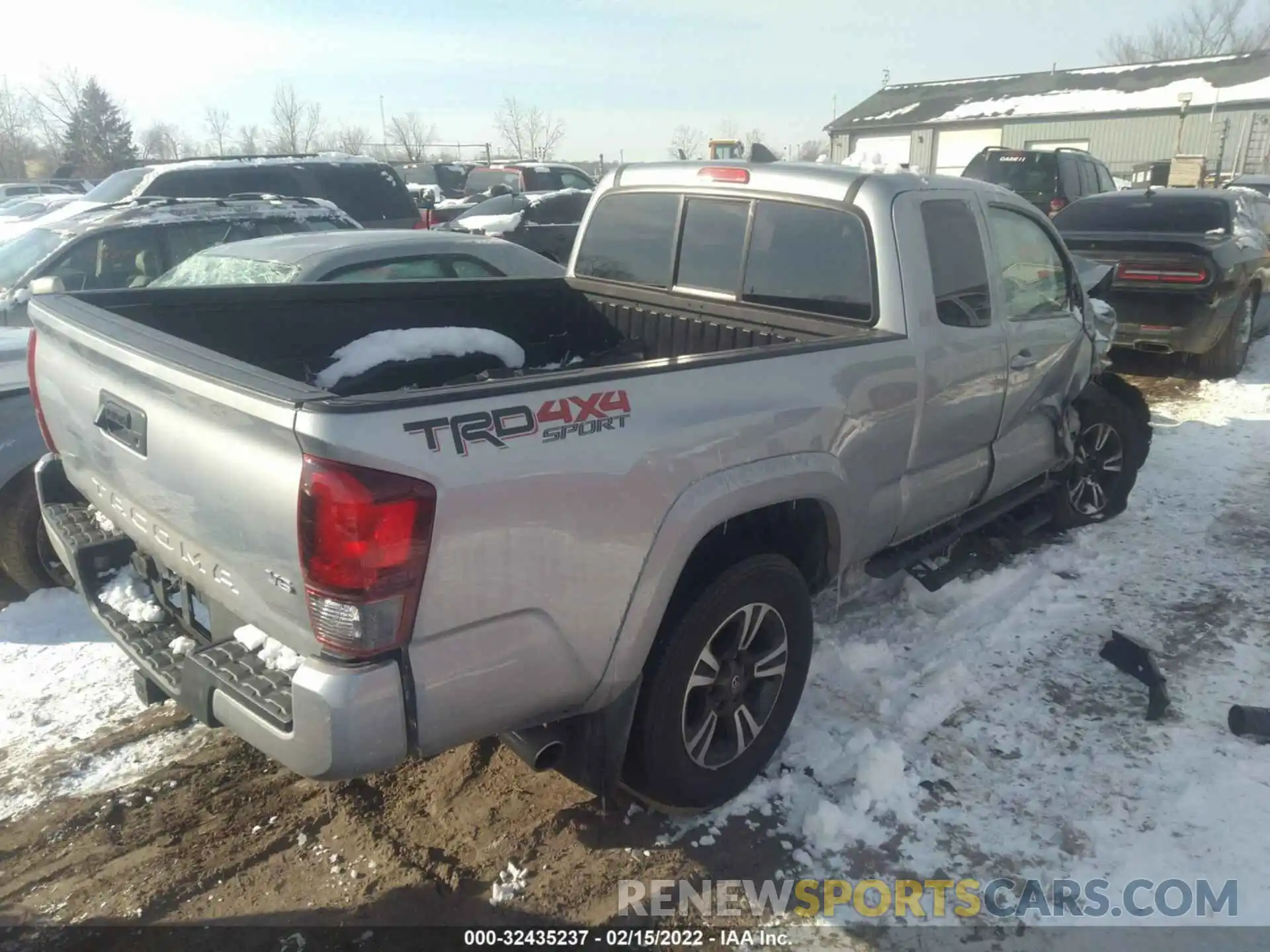 4 Photograph of a damaged car 5TFSZ5AN6KX200624 TOYOTA TACOMA 4WD 2019