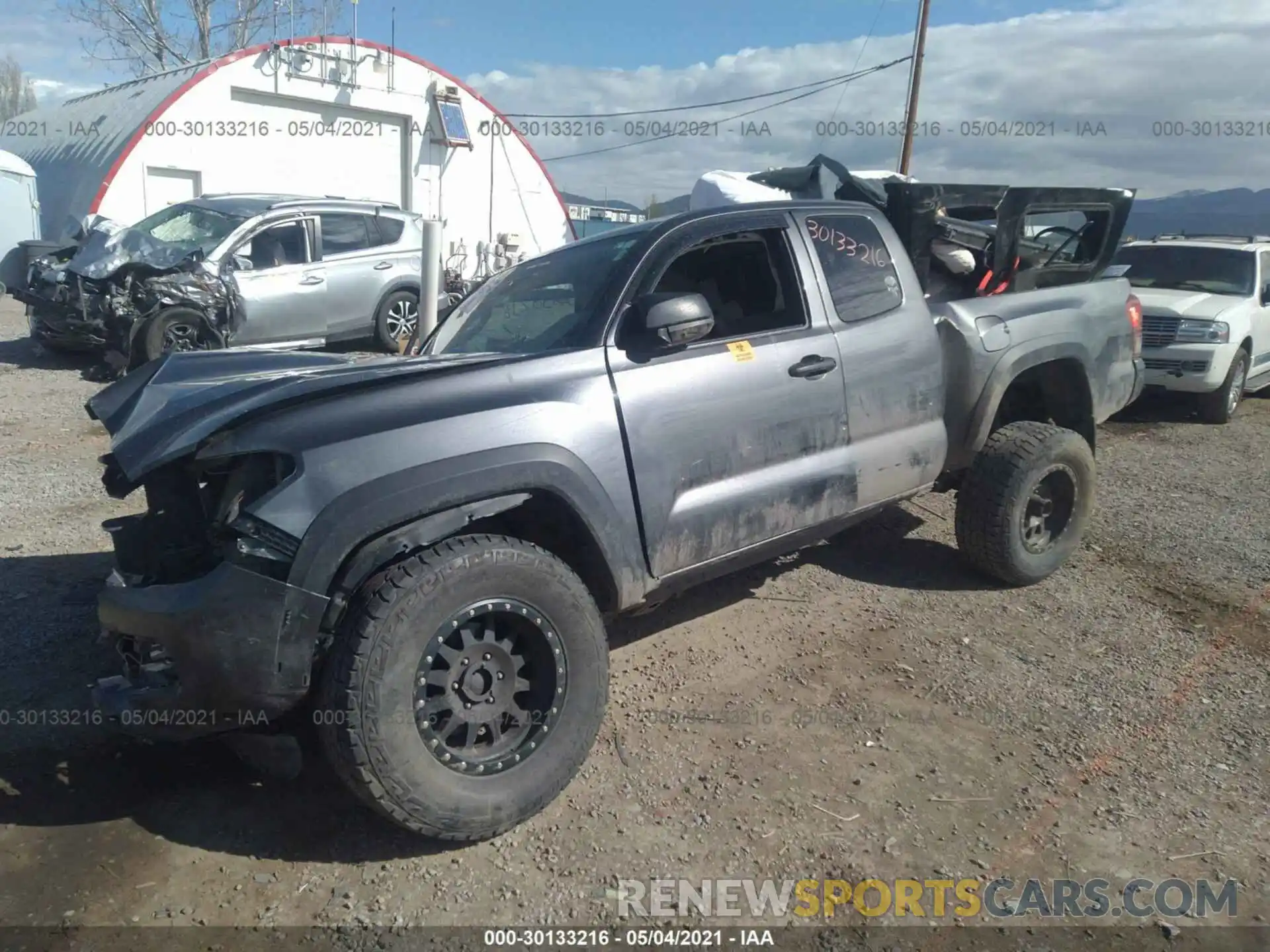 2 Photograph of a damaged car 5TFSZ5AN8KX166671 TOYOTA TACOMA 4WD 2019