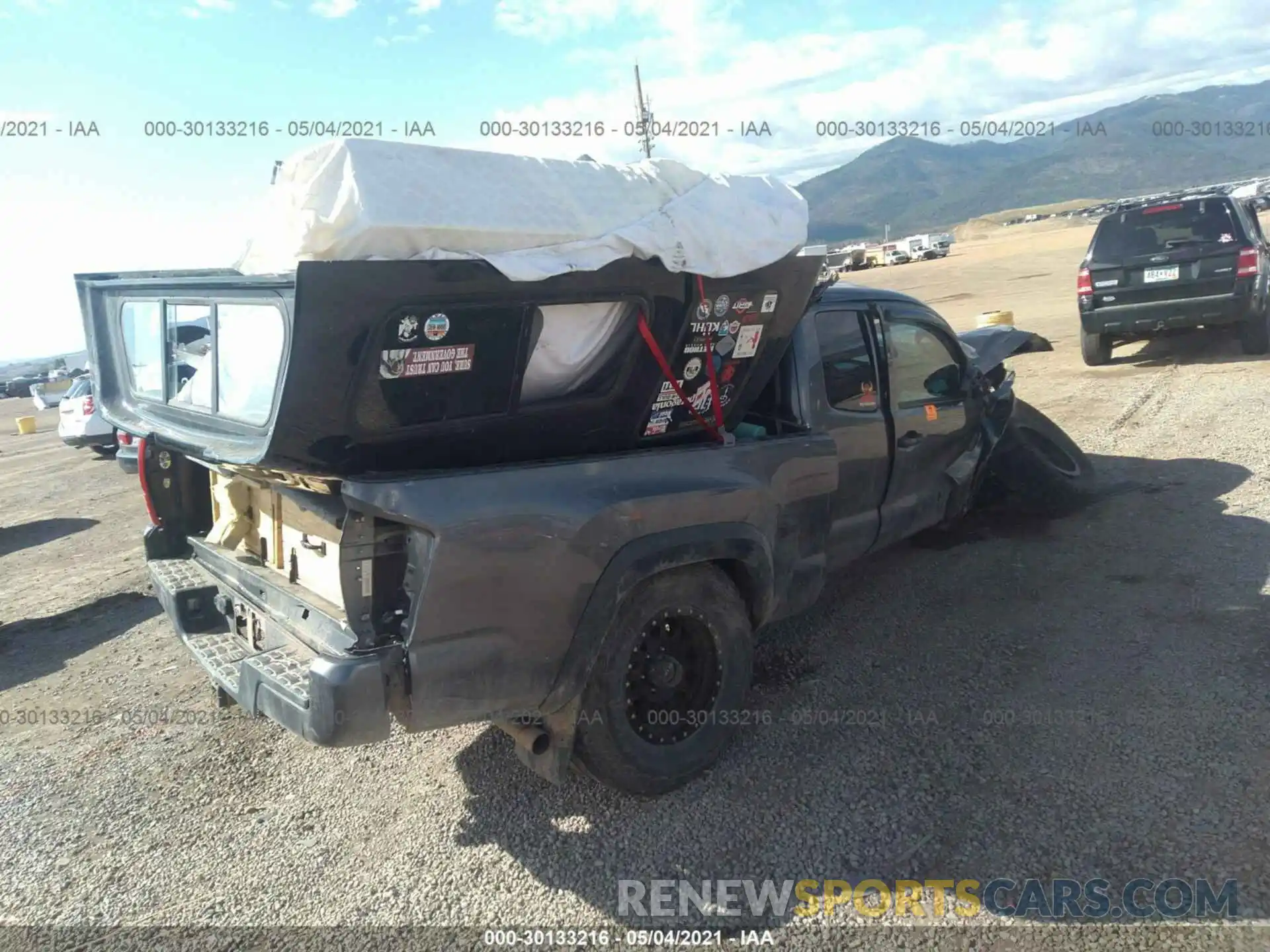 4 Photograph of a damaged car 5TFSZ5AN8KX166671 TOYOTA TACOMA 4WD 2019