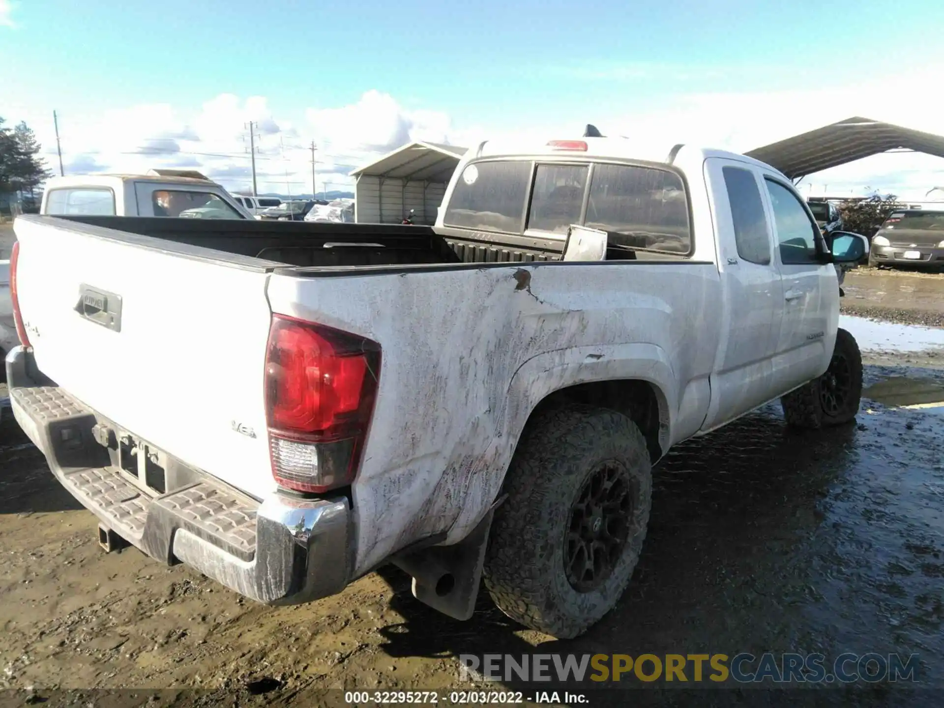 4 Photograph of a damaged car 5TFSZ5AN8KX209504 TOYOTA TACOMA 4WD 2019