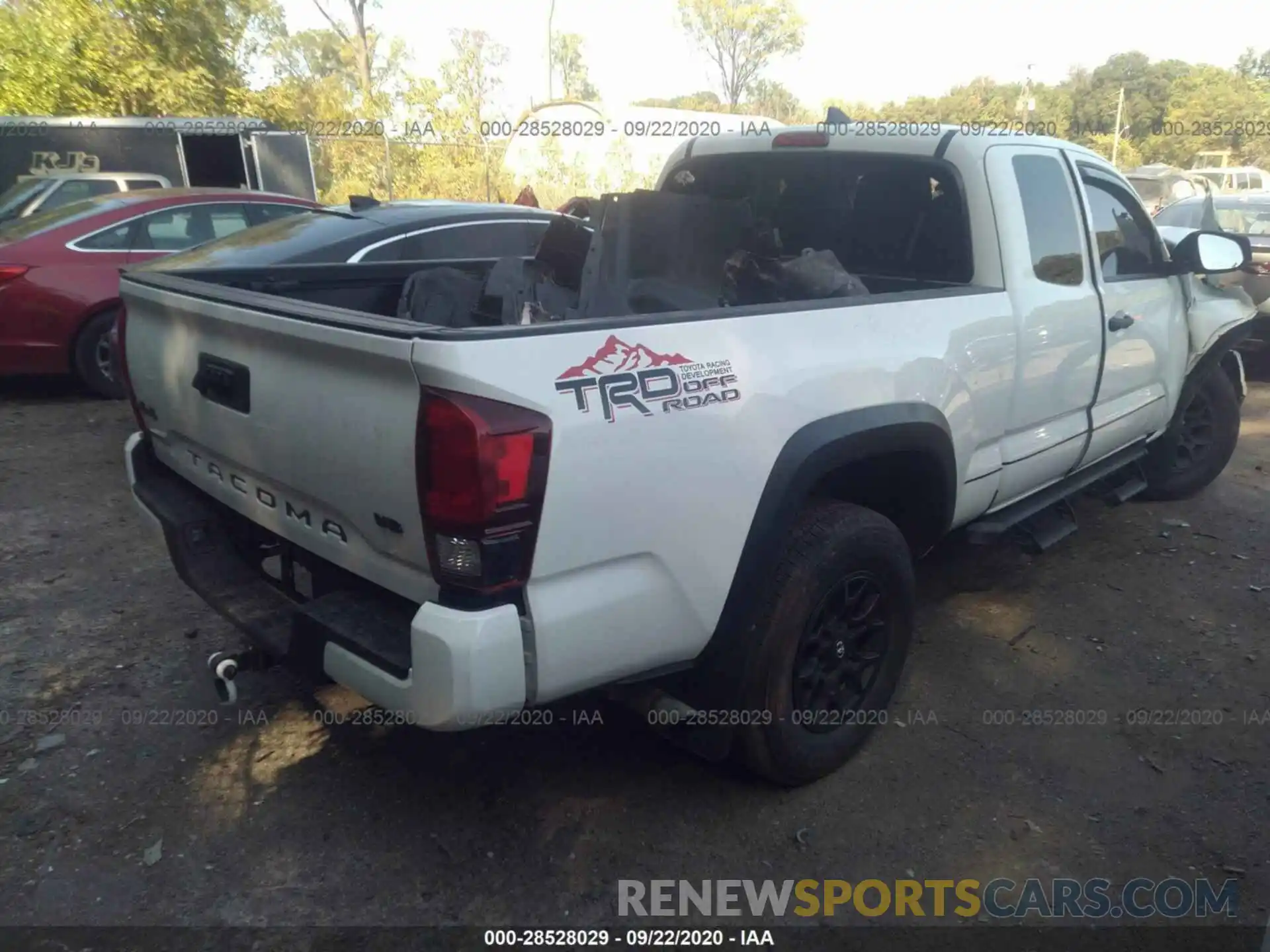 4 Photograph of a damaged car 5TFSZ5AN9KX183270 TOYOTA TACOMA 4WD 2019