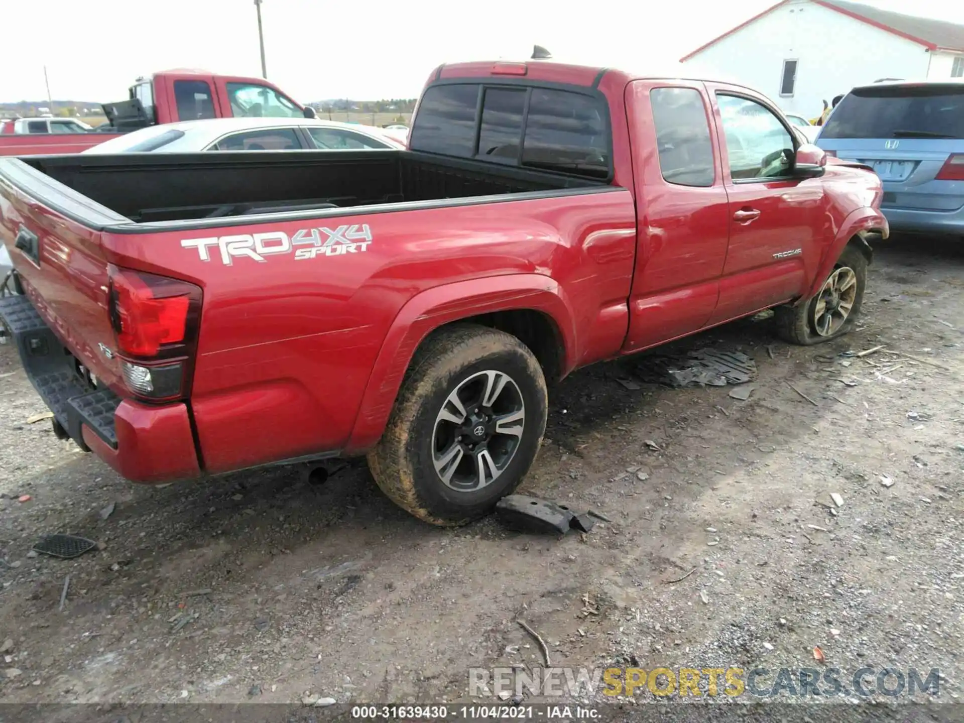 4 Photograph of a damaged car 5TFSZ5ANXKX183231 TOYOTA TACOMA 4WD 2019