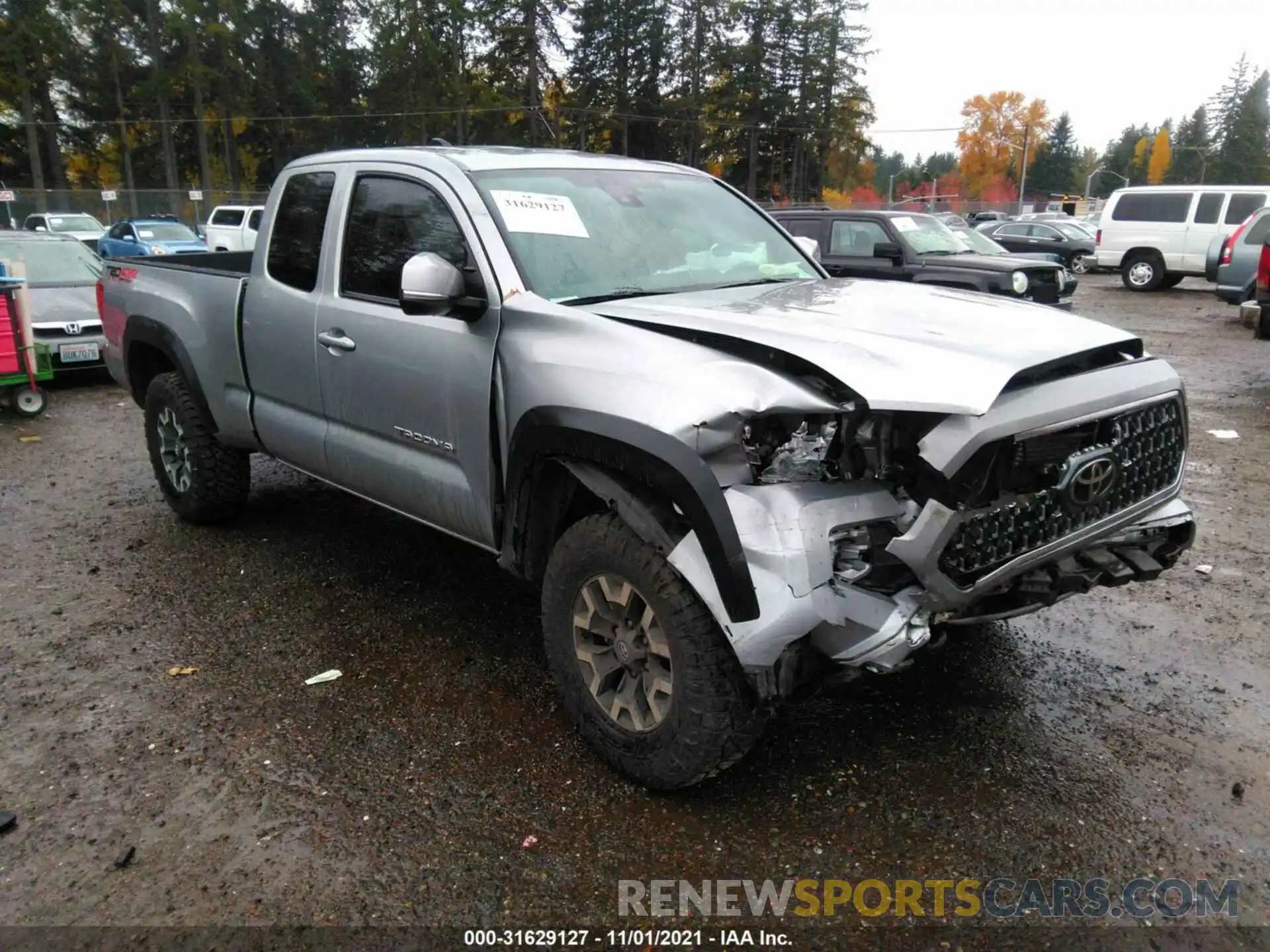 1 Photograph of a damaged car 5TFSZ5ANXKX195069 TOYOTA TACOMA 4WD 2019