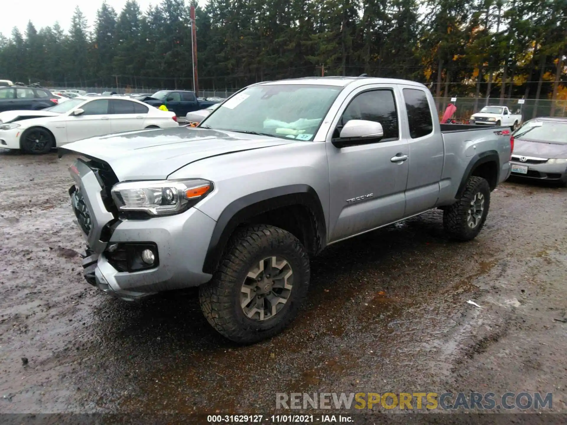 2 Photograph of a damaged car 5TFSZ5ANXKX195069 TOYOTA TACOMA 4WD 2019