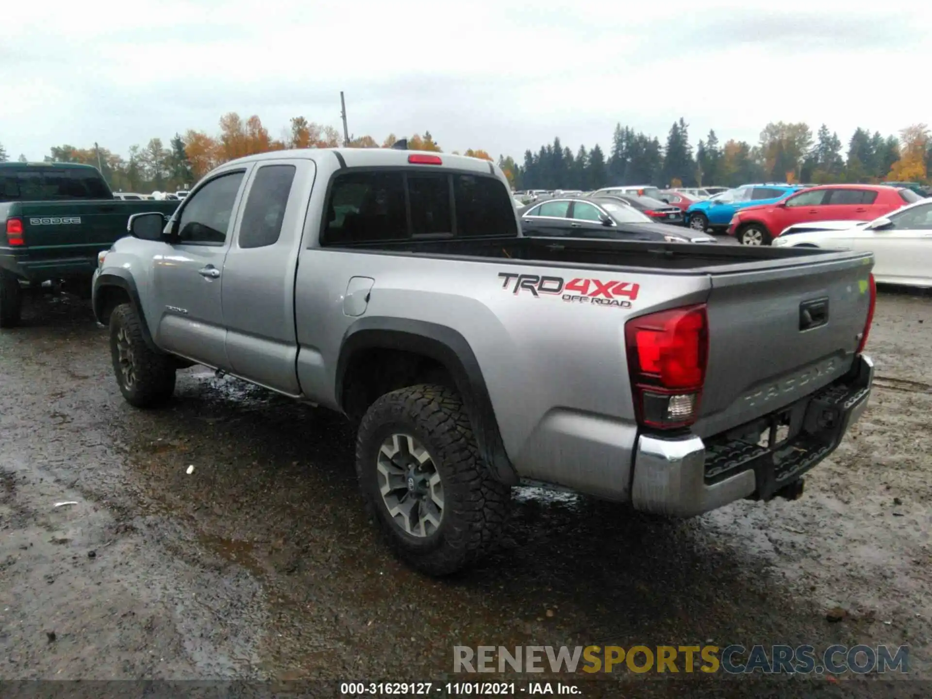 3 Photograph of a damaged car 5TFSZ5ANXKX195069 TOYOTA TACOMA 4WD 2019