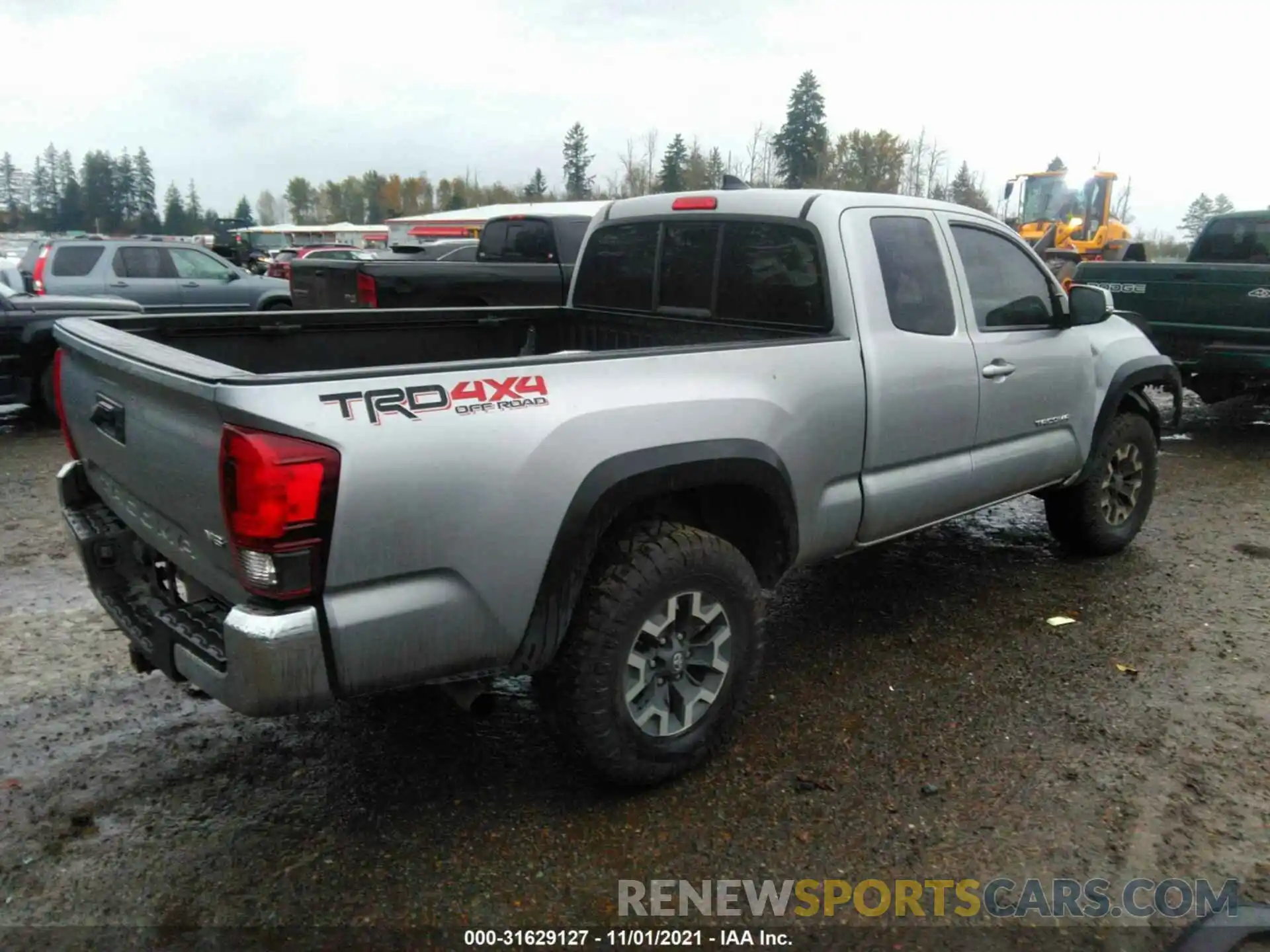 4 Photograph of a damaged car 5TFSZ5ANXKX195069 TOYOTA TACOMA 4WD 2019