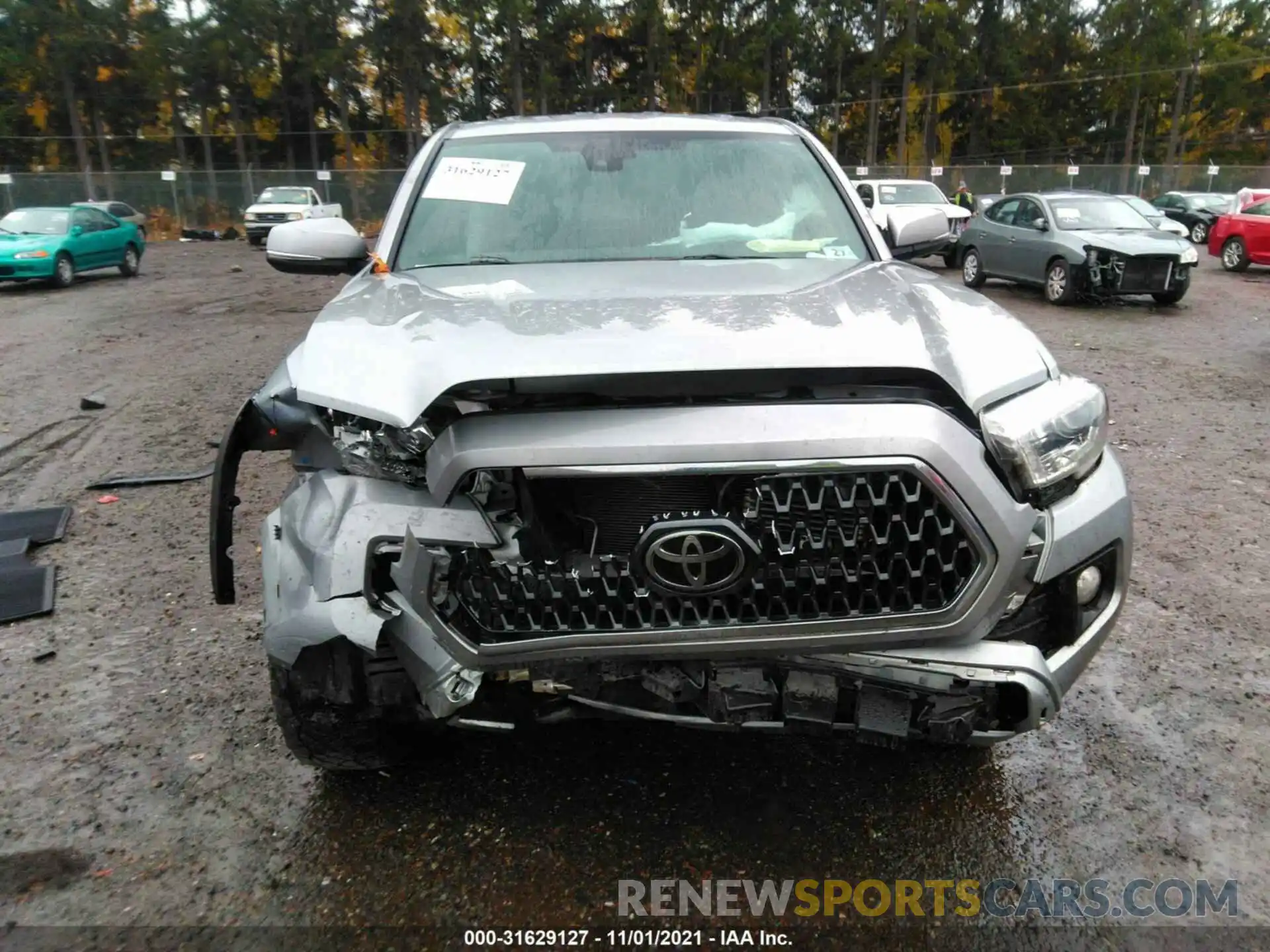 6 Photograph of a damaged car 5TFSZ5ANXKX195069 TOYOTA TACOMA 4WD 2019