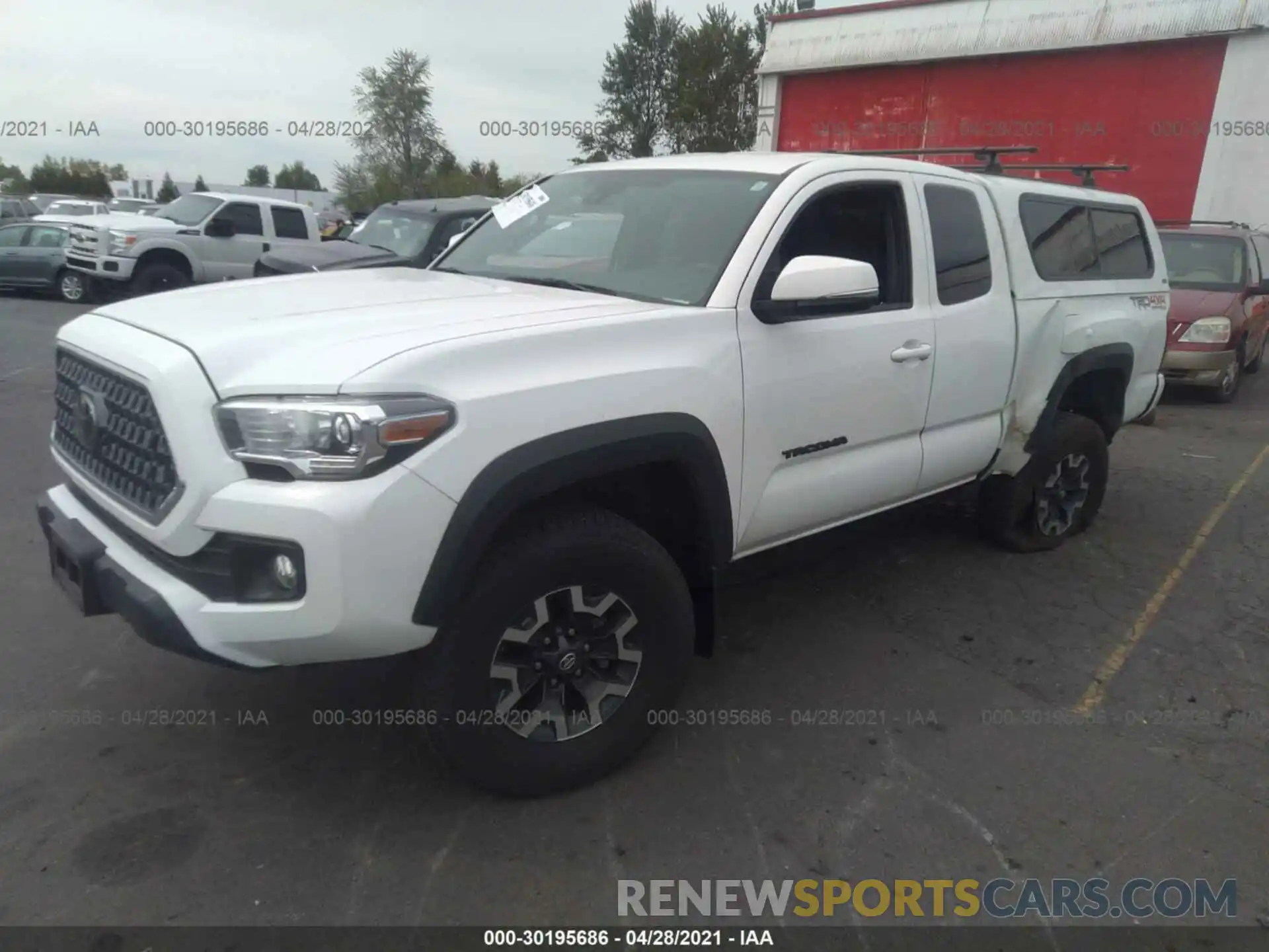 2 Photograph of a damaged car 5TFSZ5ANXKX196738 TOYOTA TACOMA 4WD 2019