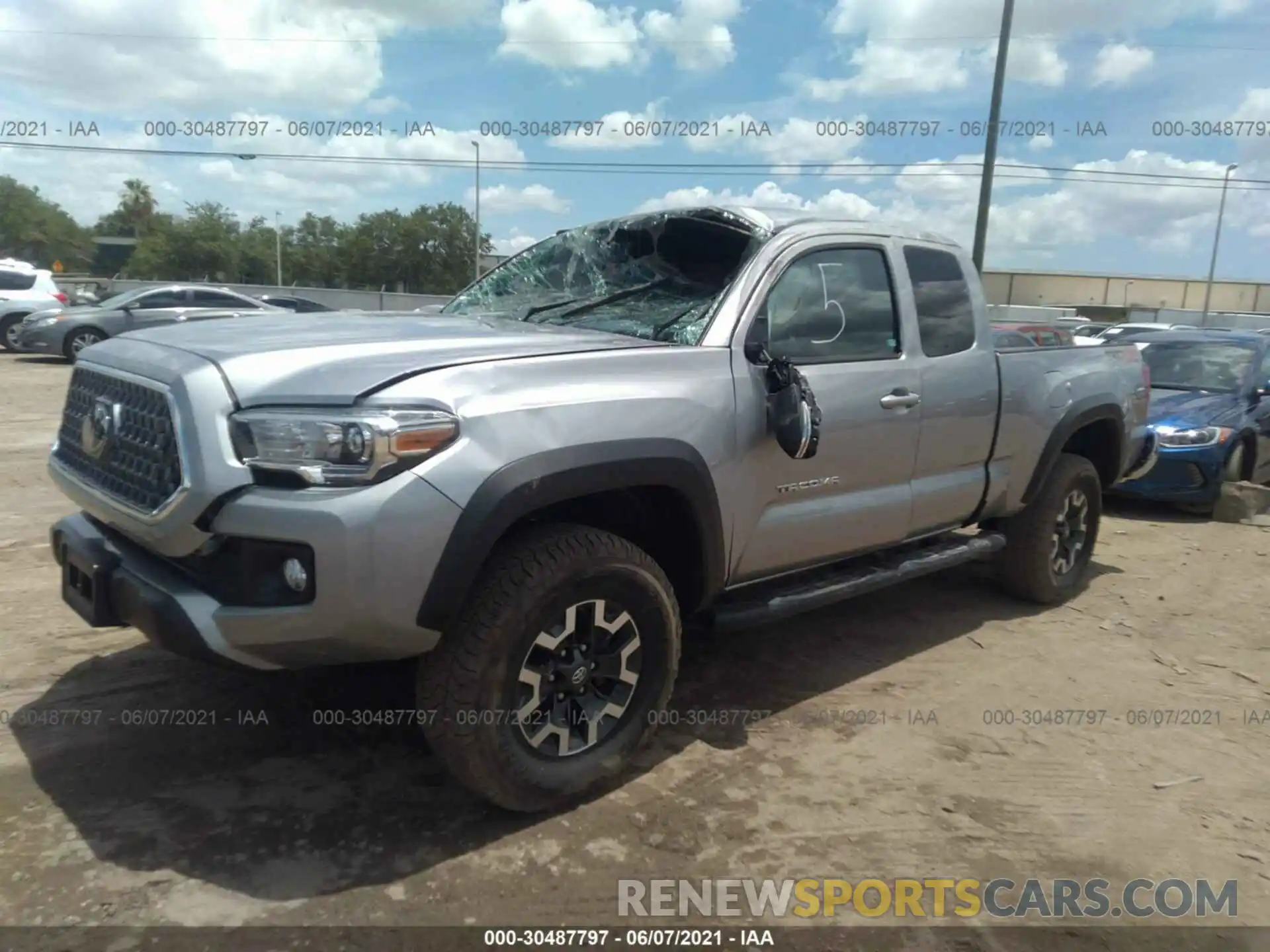 2 Photograph of a damaged car 5TFSZ5ANXKX198487 TOYOTA TACOMA 4WD 2019