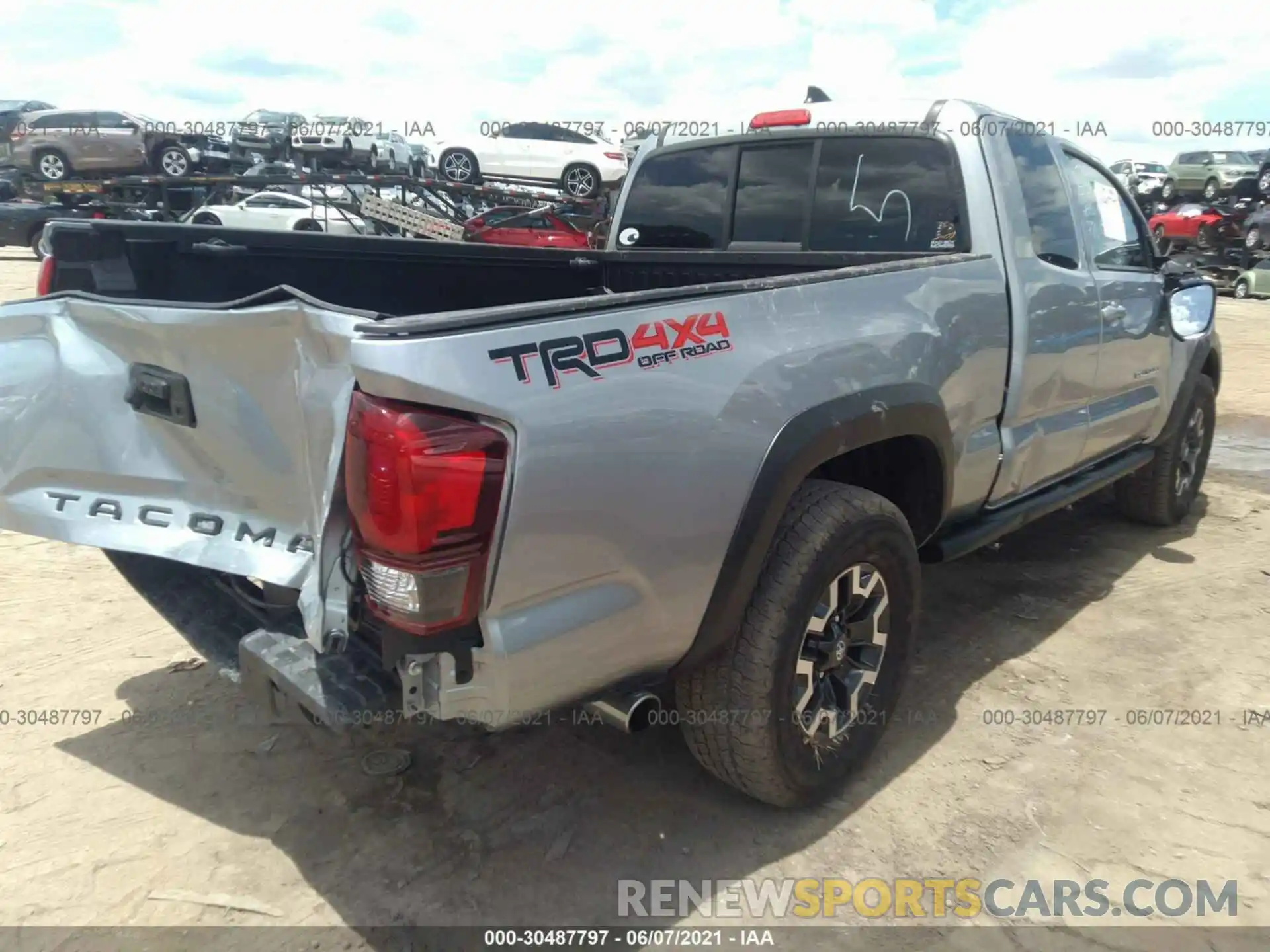 4 Photograph of a damaged car 5TFSZ5ANXKX198487 TOYOTA TACOMA 4WD 2019