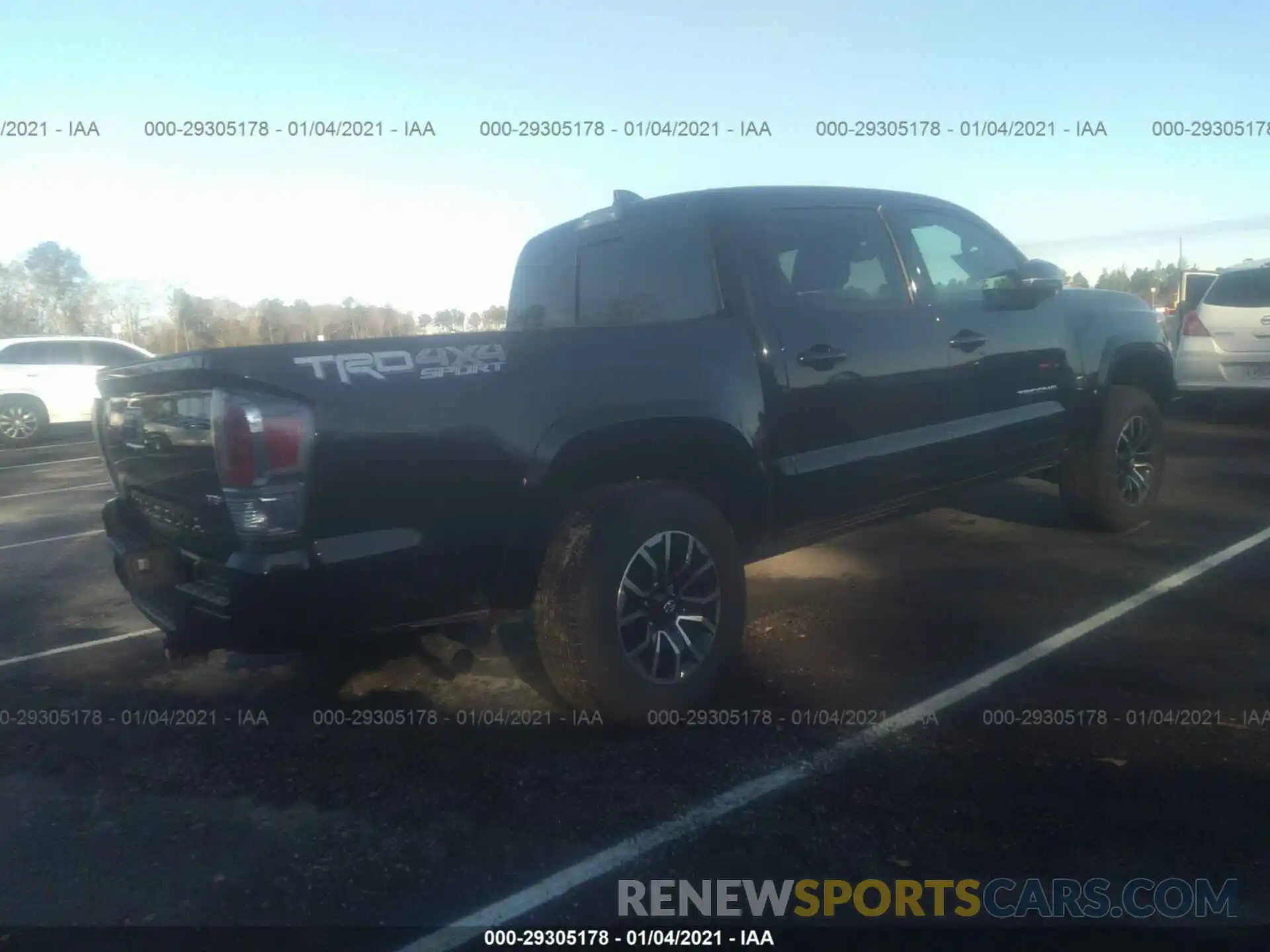 4 Photograph of a damaged car 3TMCZ5AN0LM318809 TOYOTA TACOMA 4WD 2020