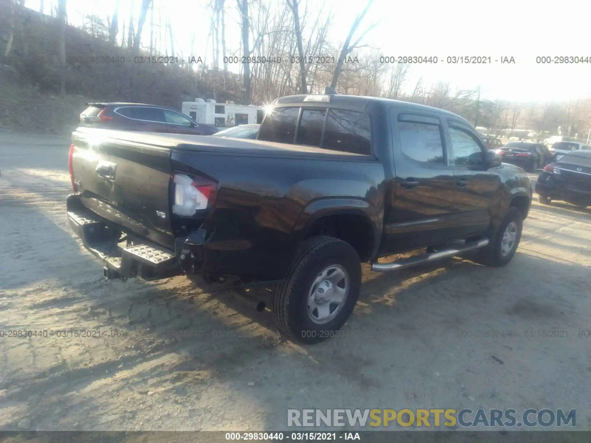 4 Photograph of a damaged car 3TMCZ5AN0LM329020 TOYOTA TACOMA 4WD 2020