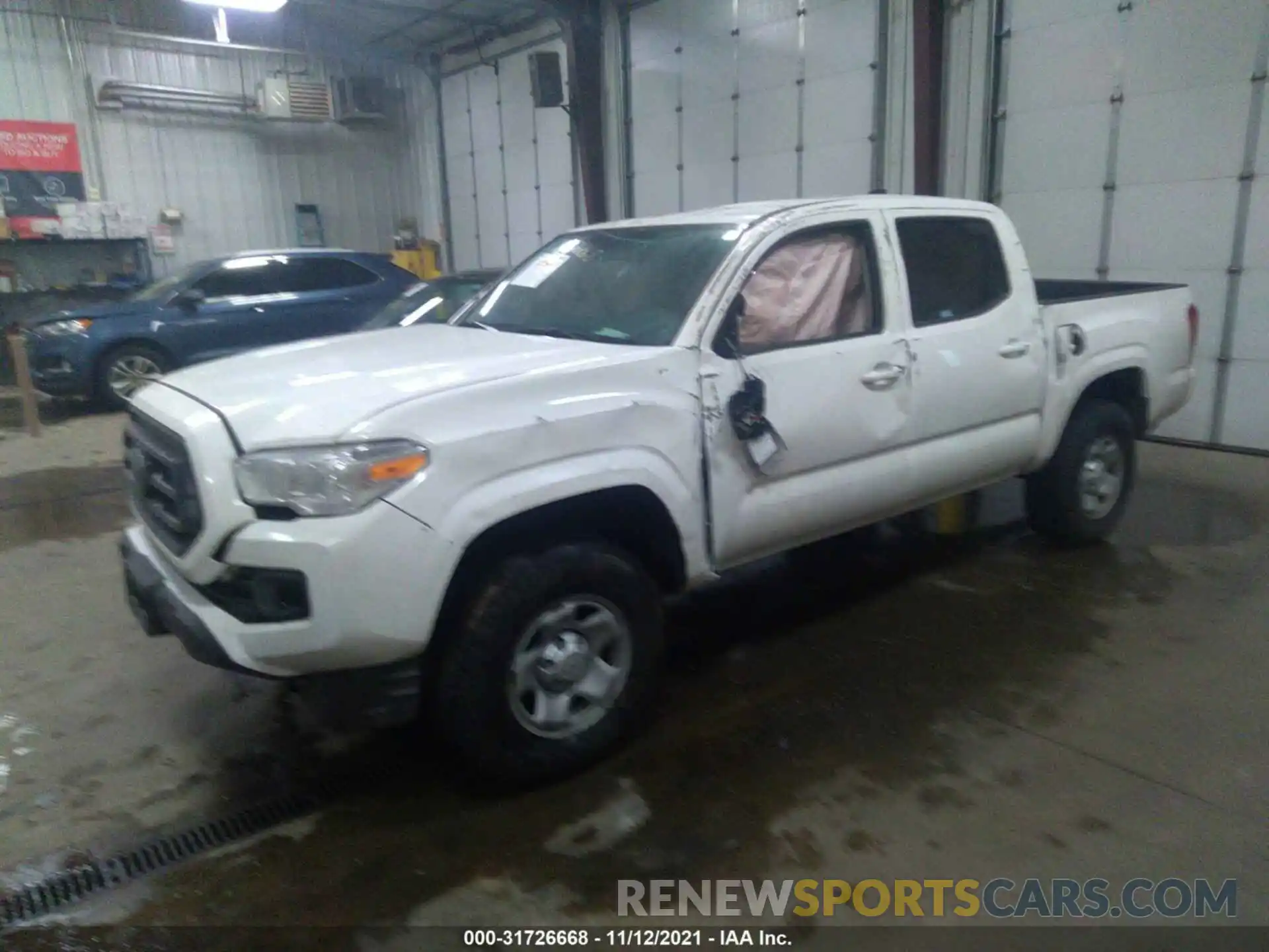 2 Photograph of a damaged car 3TMCZ5AN0LM336548 TOYOTA TACOMA 4WD 2020