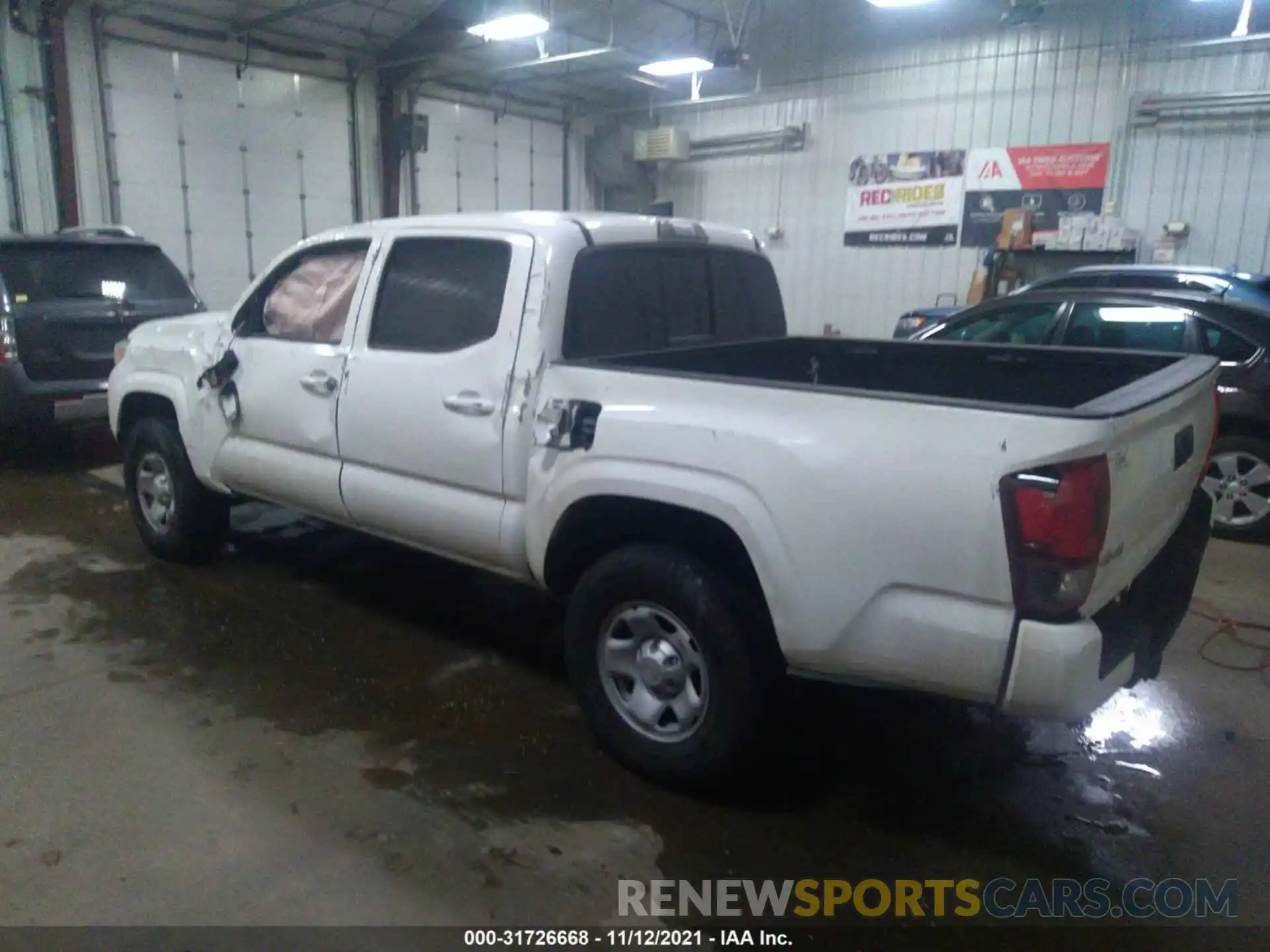 3 Photograph of a damaged car 3TMCZ5AN0LM336548 TOYOTA TACOMA 4WD 2020