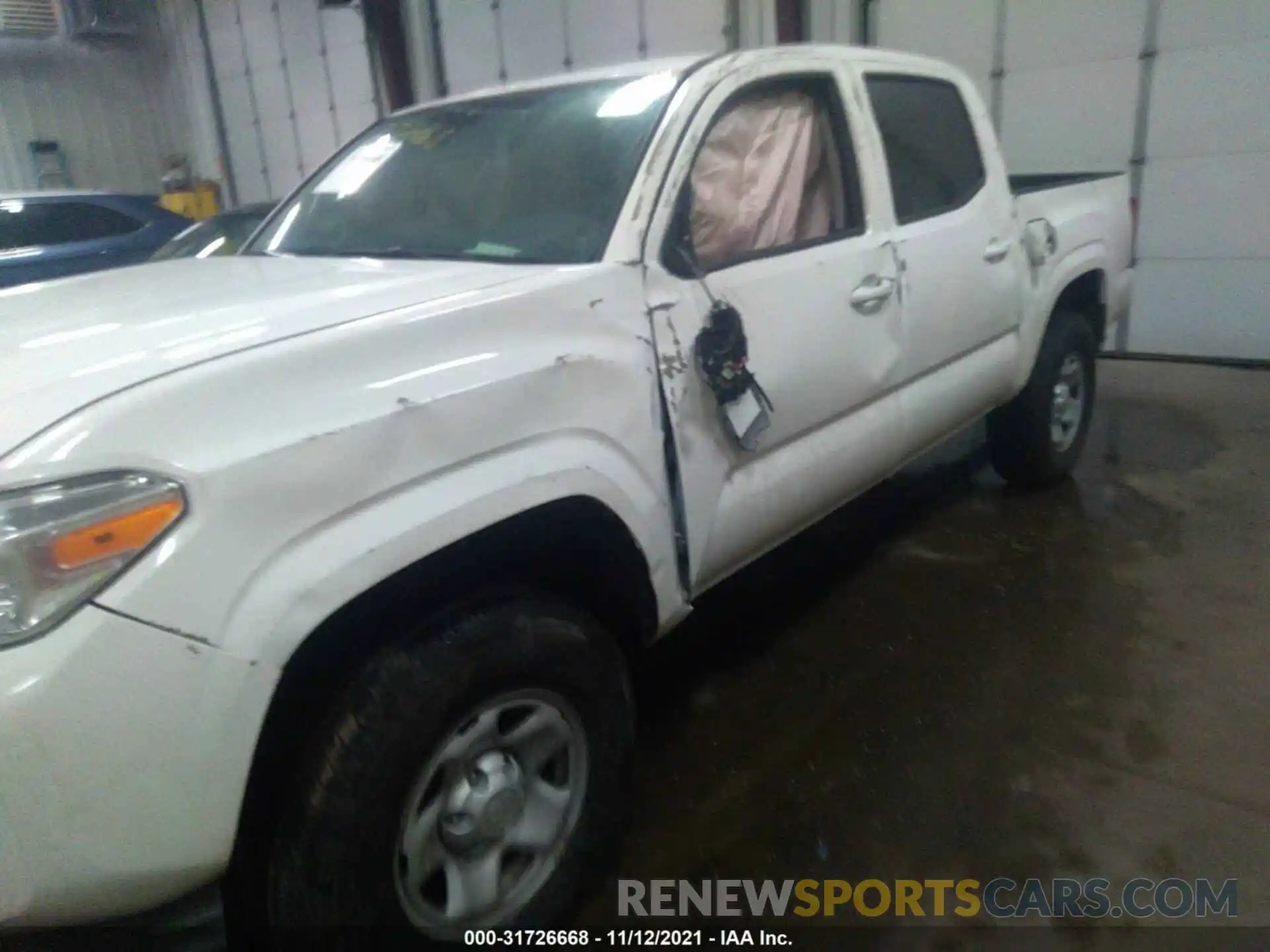 6 Photograph of a damaged car 3TMCZ5AN0LM336548 TOYOTA TACOMA 4WD 2020