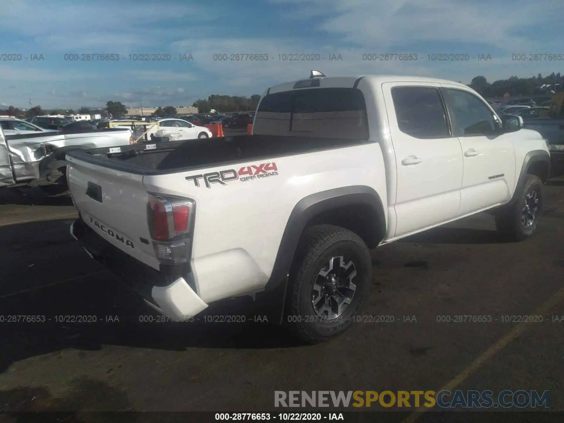 4 Photograph of a damaged car 3TMCZ5AN0LM340907 TOYOTA TACOMA 4WD 2020