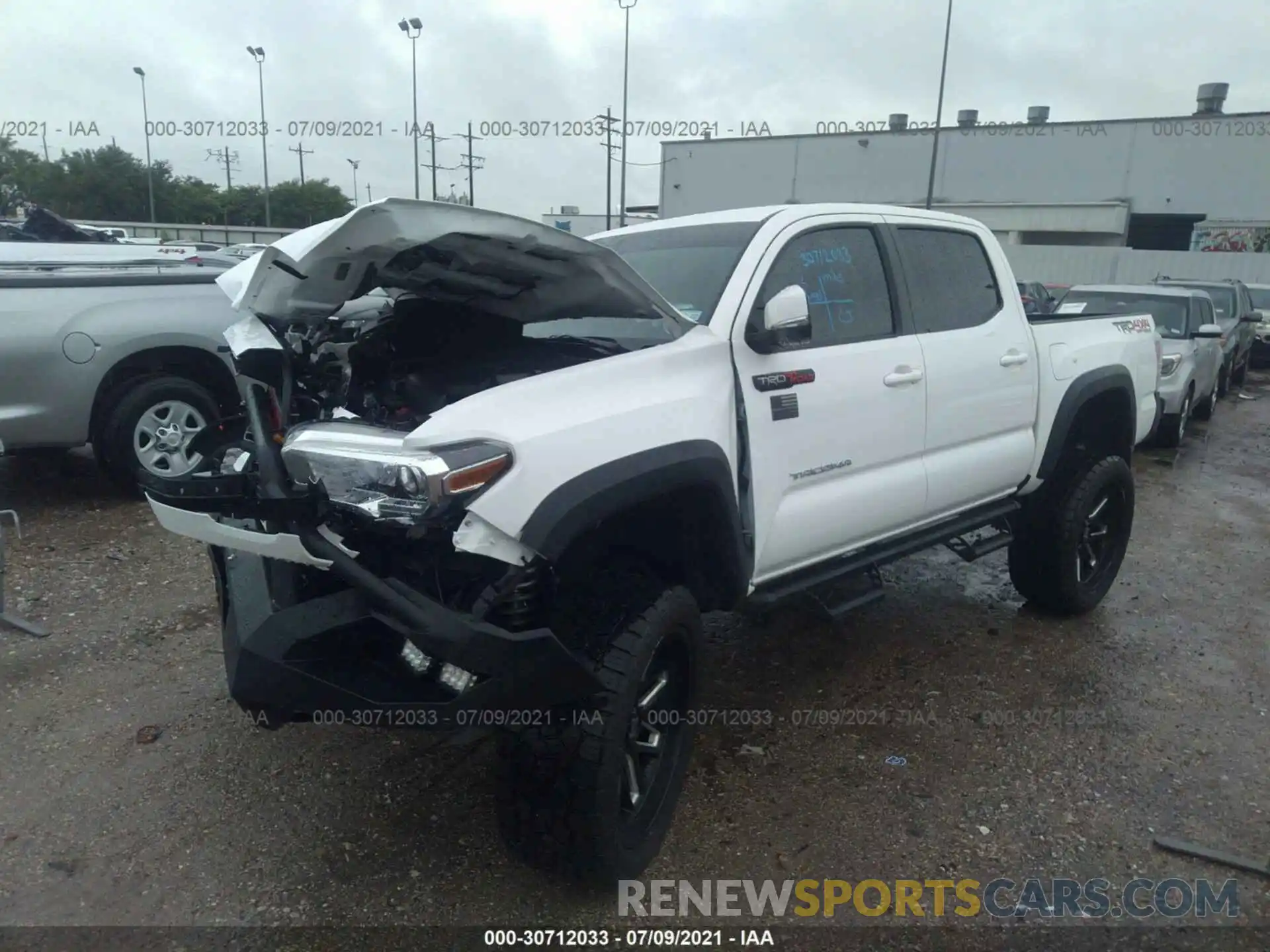 2 Photograph of a damaged car 3TMCZ5AN0LM343998 TOYOTA TACOMA 4WD 2020