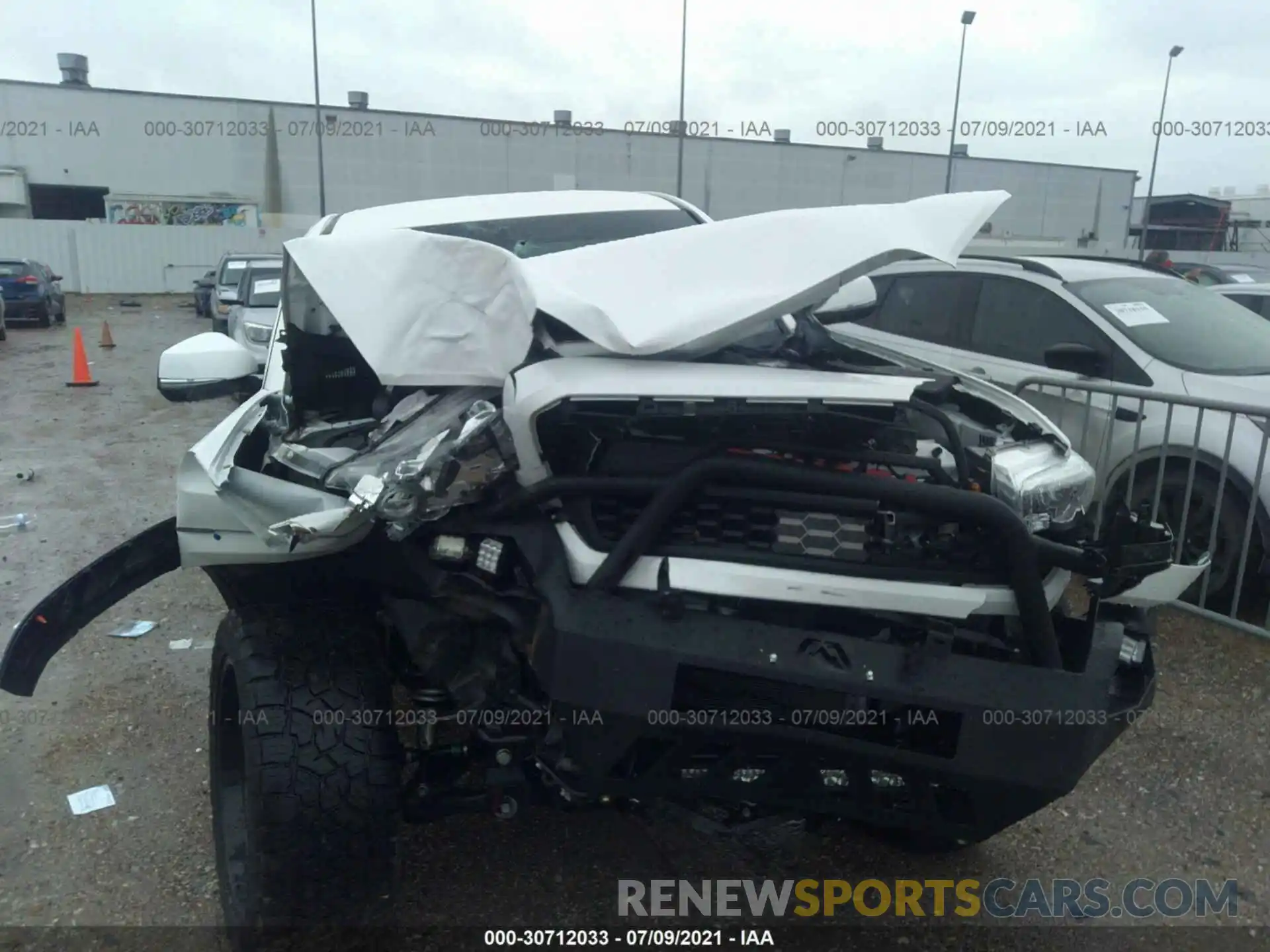 6 Photograph of a damaged car 3TMCZ5AN0LM343998 TOYOTA TACOMA 4WD 2020