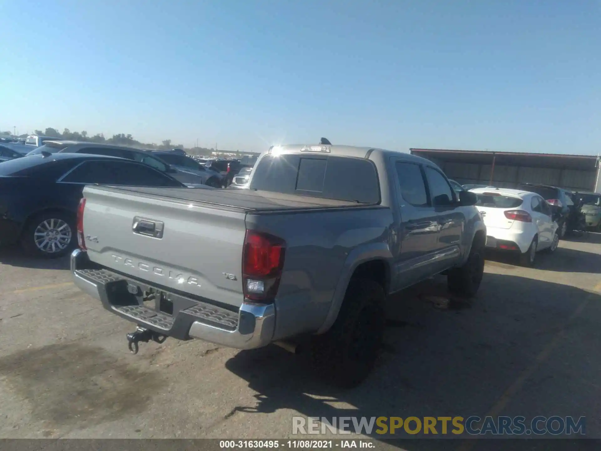 4 Photograph of a damaged car 3TMCZ5AN1LM294410 TOYOTA TACOMA 4WD 2020