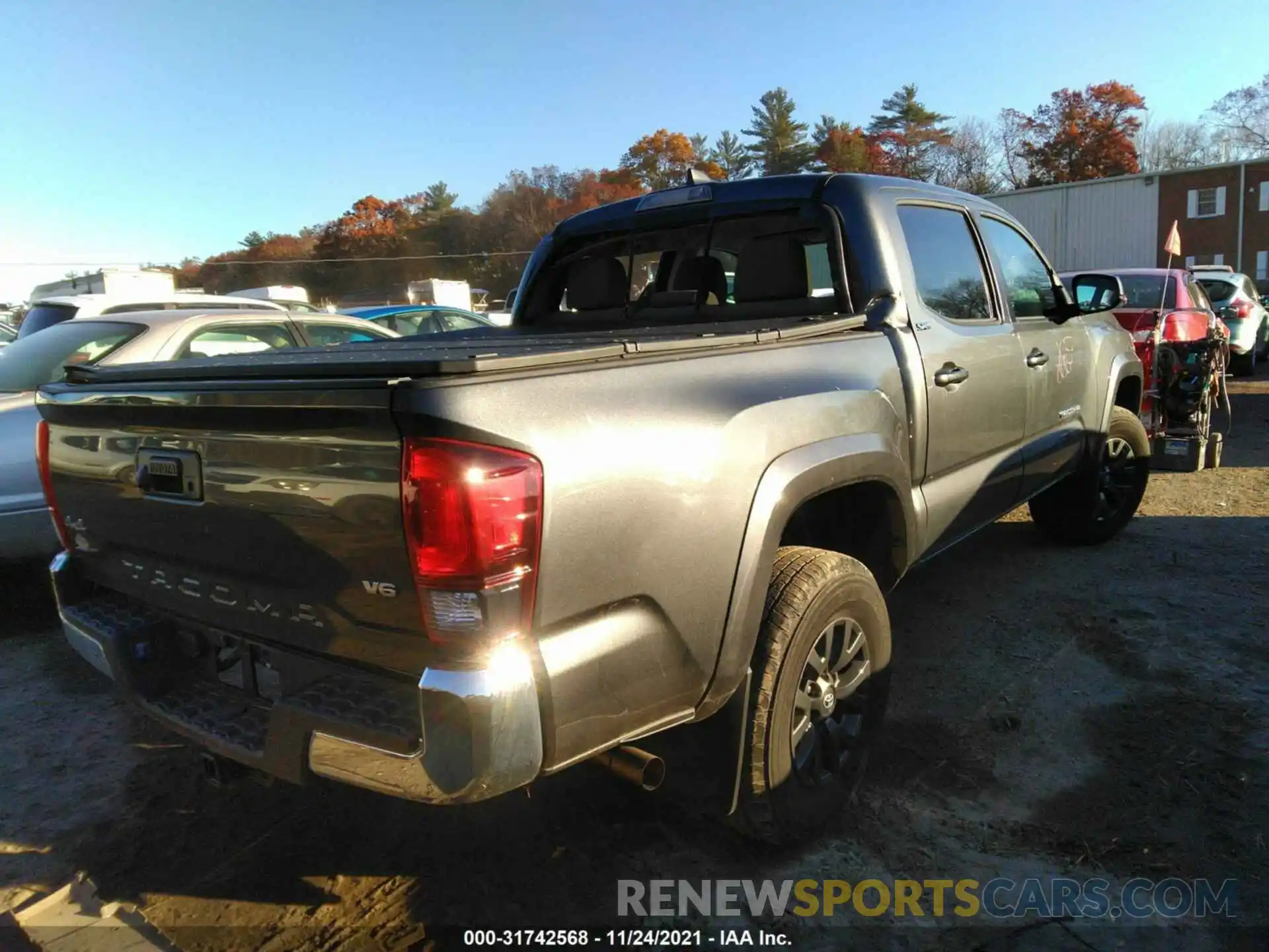 4 Photograph of a damaged car 3TMCZ5AN1LM306765 TOYOTA TACOMA 4WD 2020