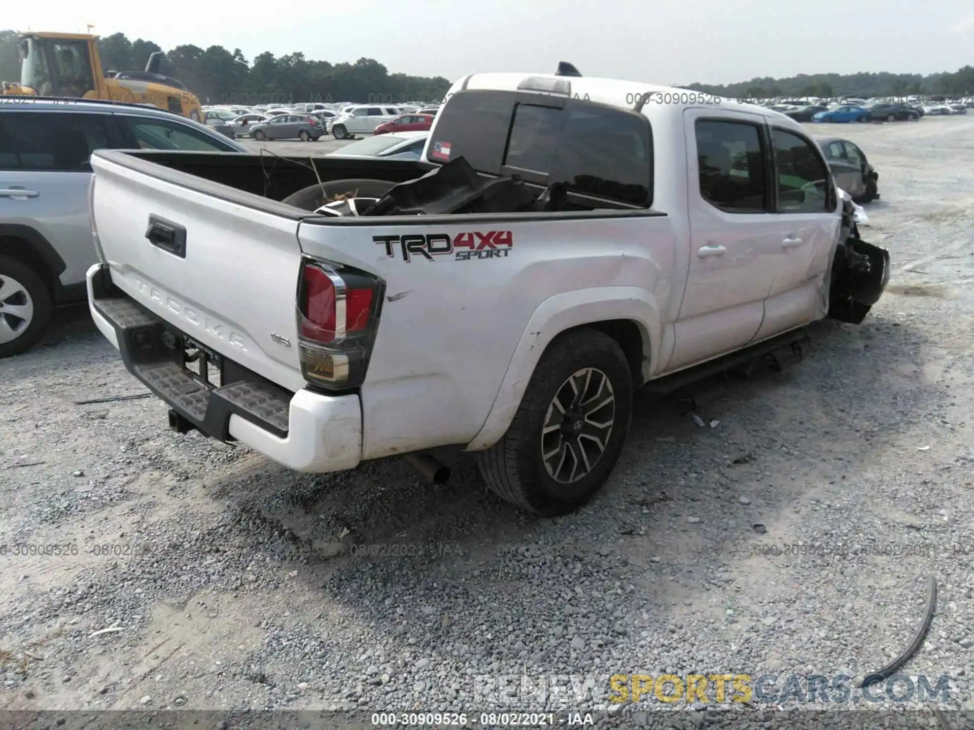 4 Photograph of a damaged car 3TMCZ5AN2LM291113 TOYOTA TACOMA 4WD 2020