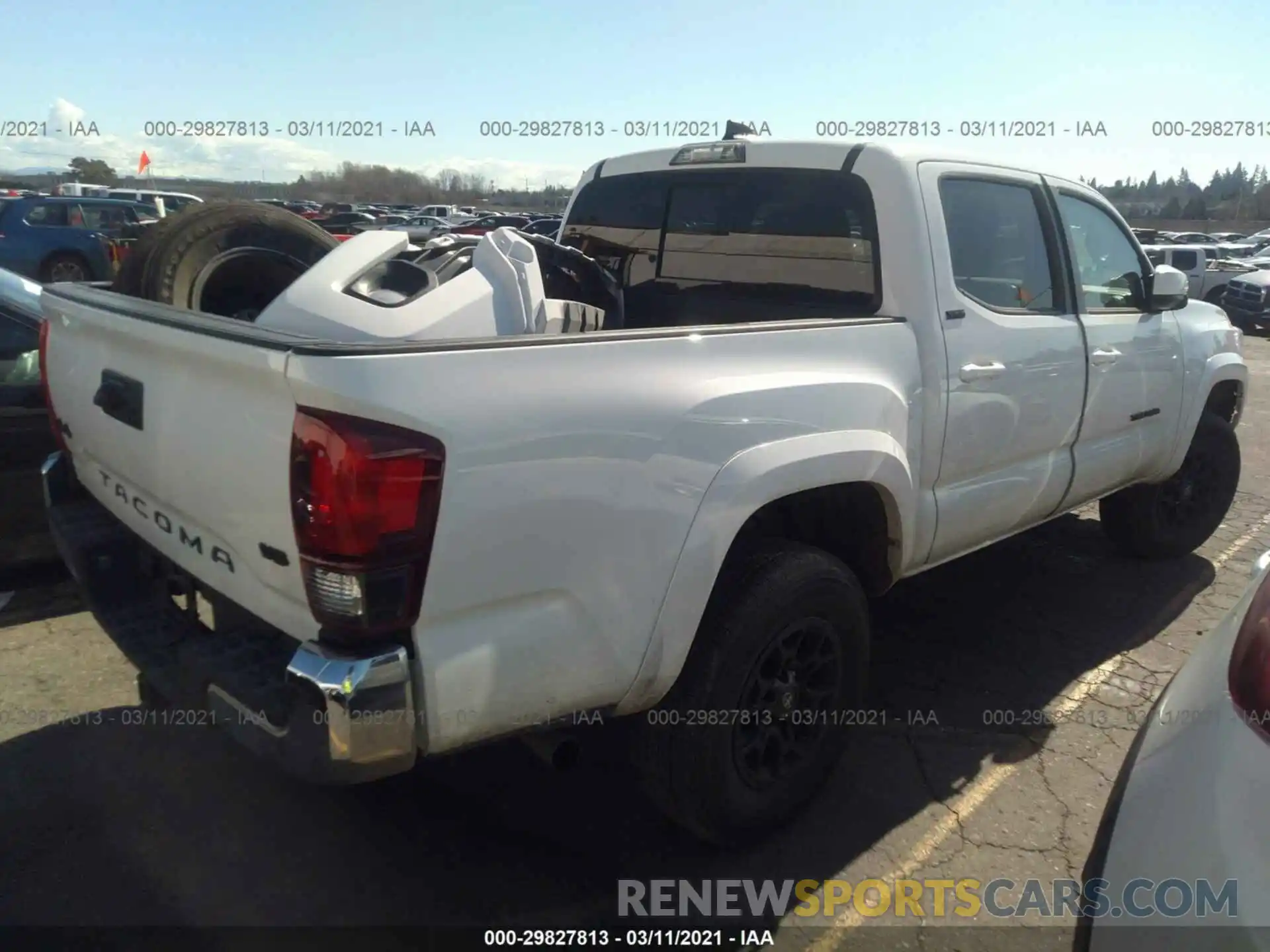 4 Photograph of a damaged car 3TMCZ5AN2LM291886 TOYOTA TACOMA 4WD 2020