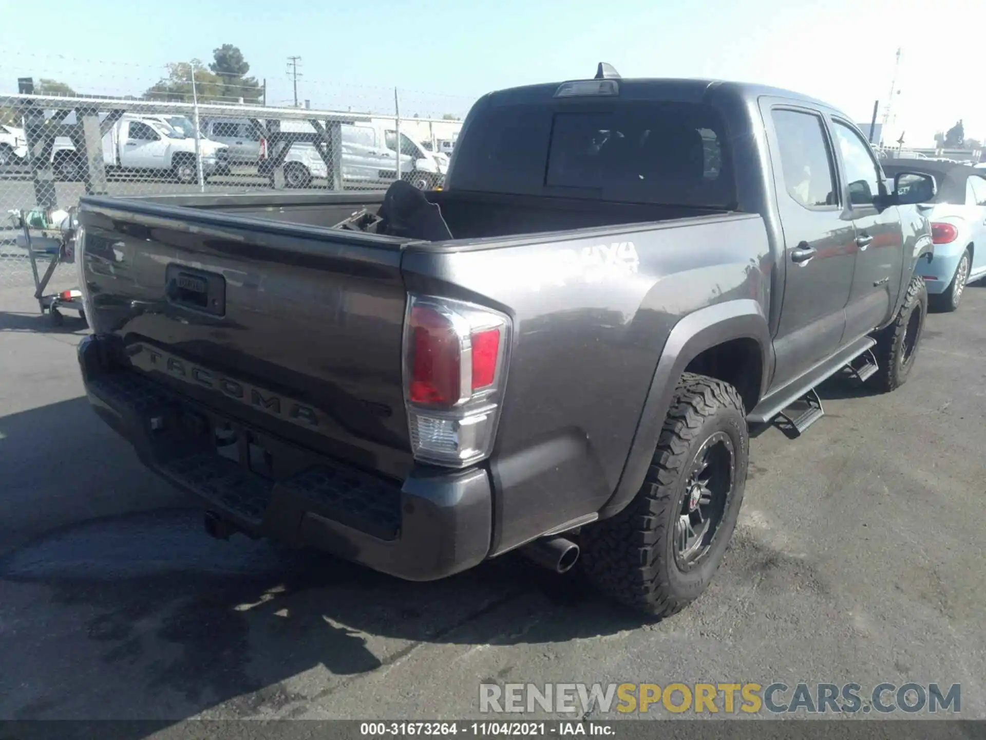 4 Photograph of a damaged car 3TMCZ5AN2LM296683 TOYOTA TACOMA 4WD 2020