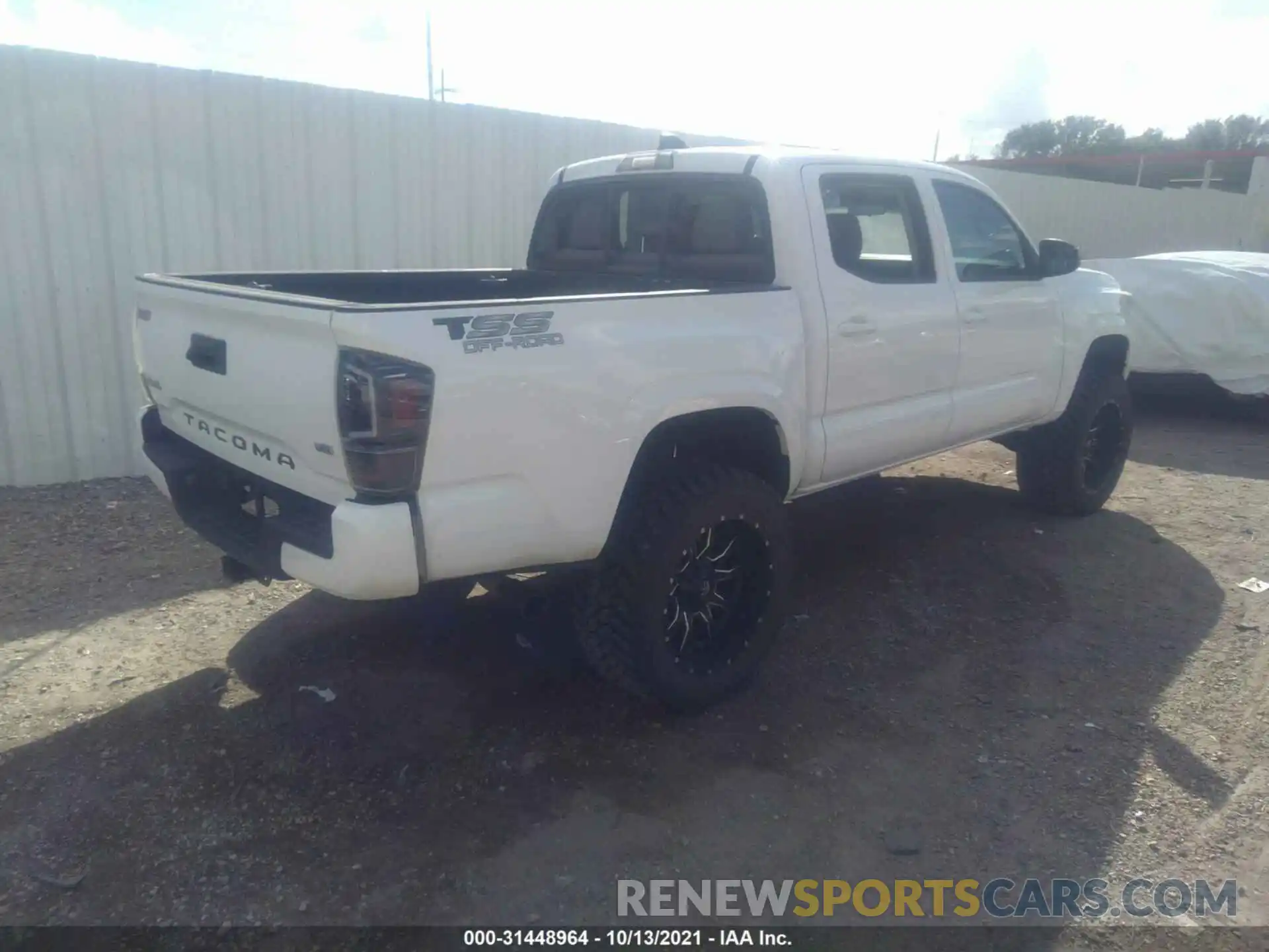 4 Photograph of a damaged car 3TMCZ5AN2LM300831 TOYOTA TACOMA 4WD 2020