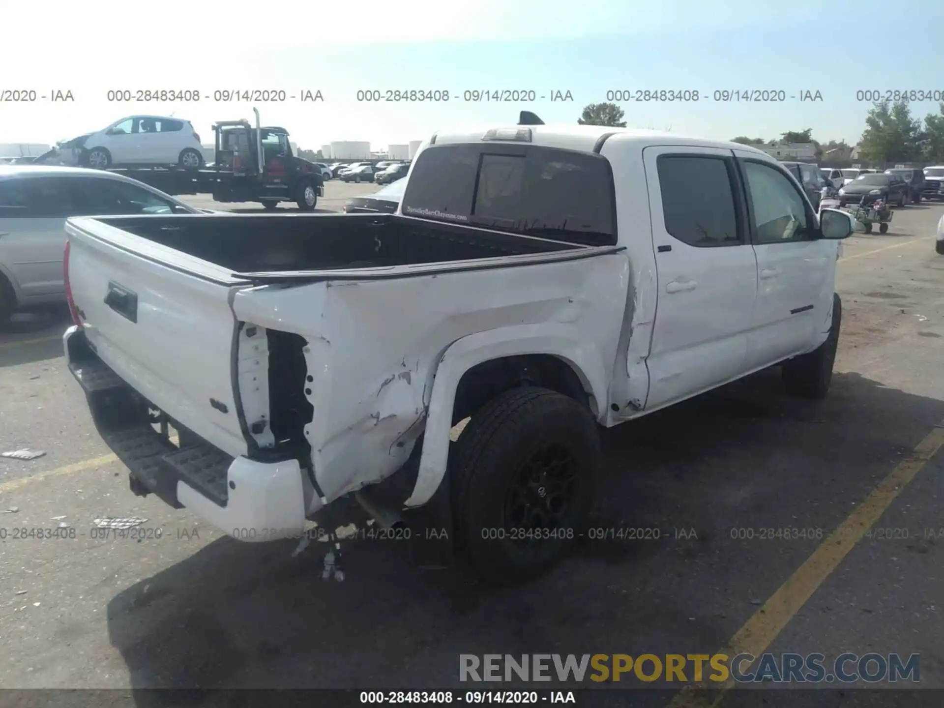 4 Photograph of a damaged car 3TMCZ5AN2LM312039 TOYOTA TACOMA 4WD 2020