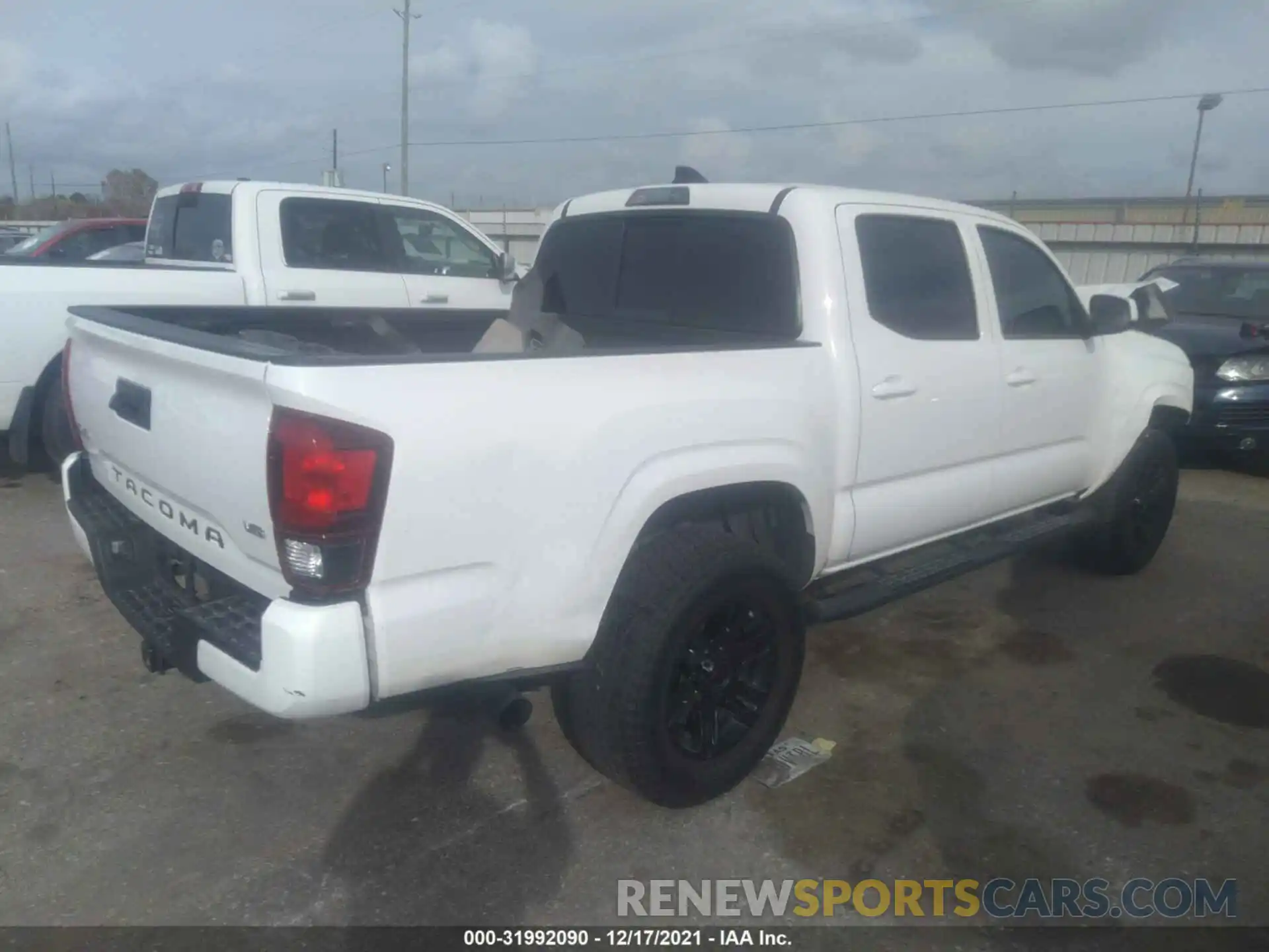 4 Photograph of a damaged car 3TMCZ5AN3LM304810 TOYOTA TACOMA 4WD 2020