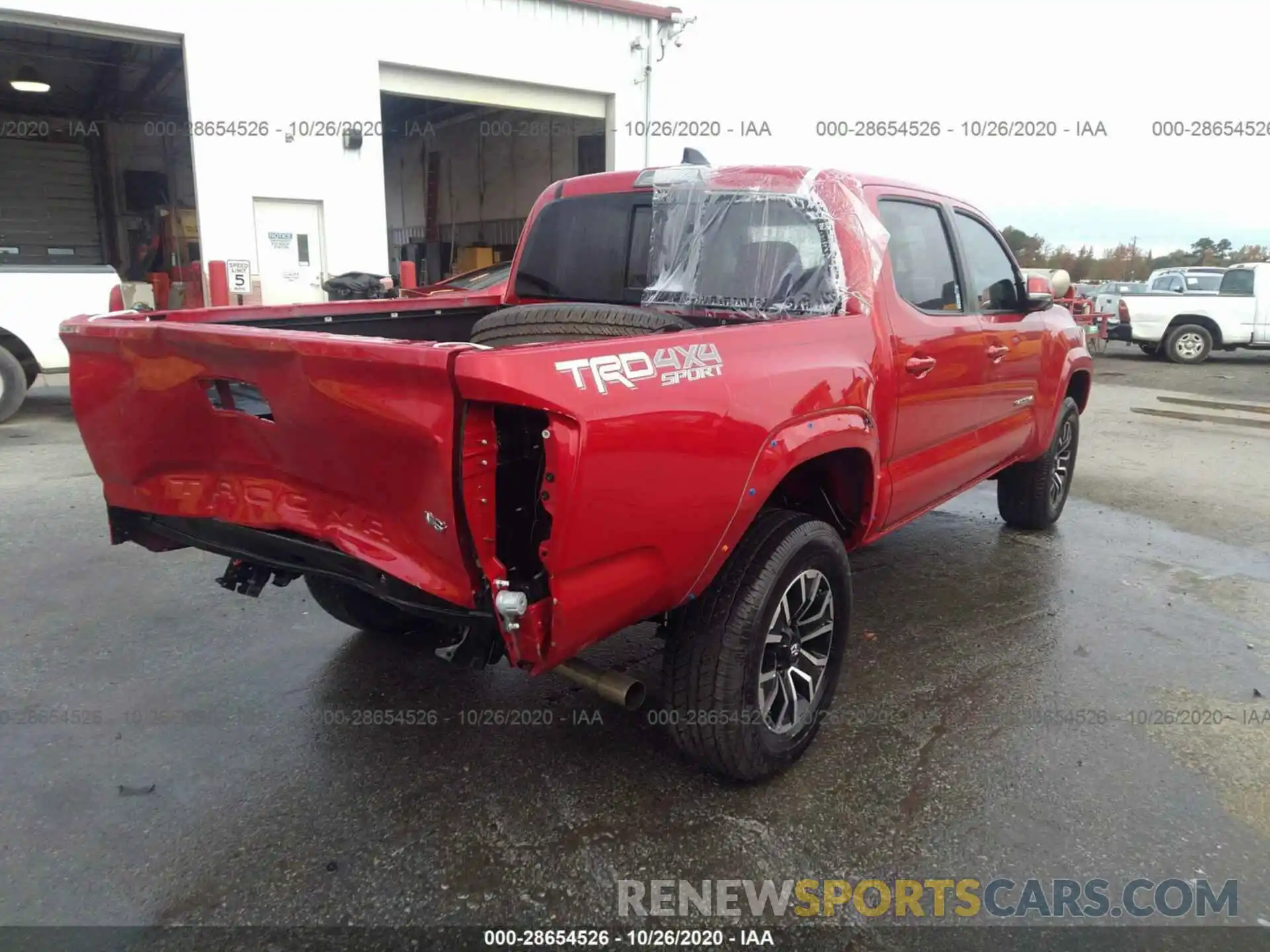 4 Photograph of a damaged car 3TMCZ5AN3LM315659 TOYOTA TACOMA 4WD 2020