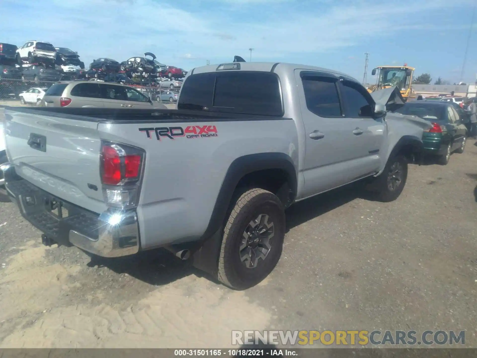 4 Photograph of a damaged car 3TMCZ5AN3LM318903 TOYOTA TACOMA 4WD 2020