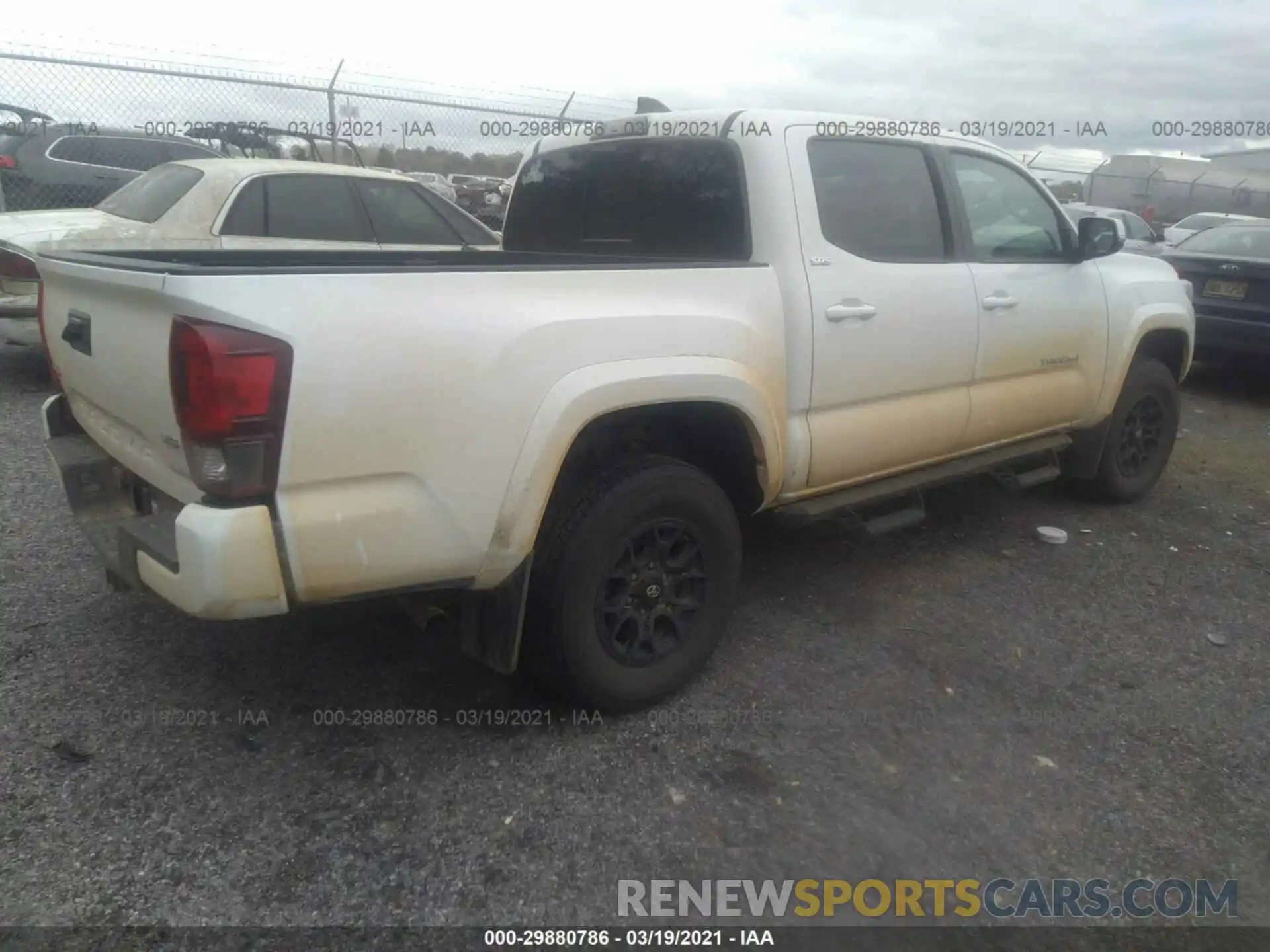 4 Photograph of a damaged car 3TMCZ5AN3LM321140 TOYOTA TACOMA 4WD 2020