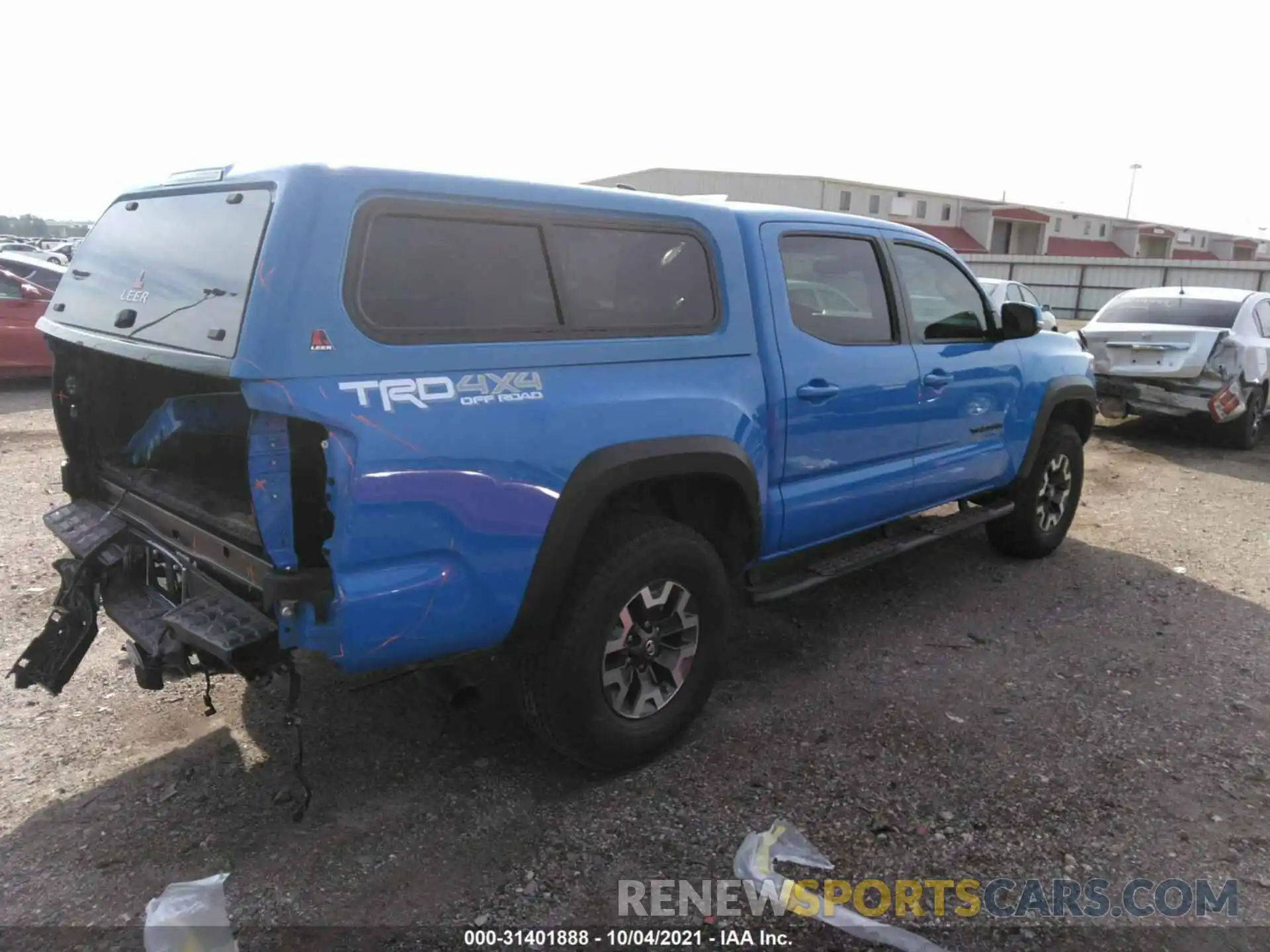 4 Photograph of a damaged car 3TMCZ5AN3LM327343 TOYOTA TACOMA 4WD 2020