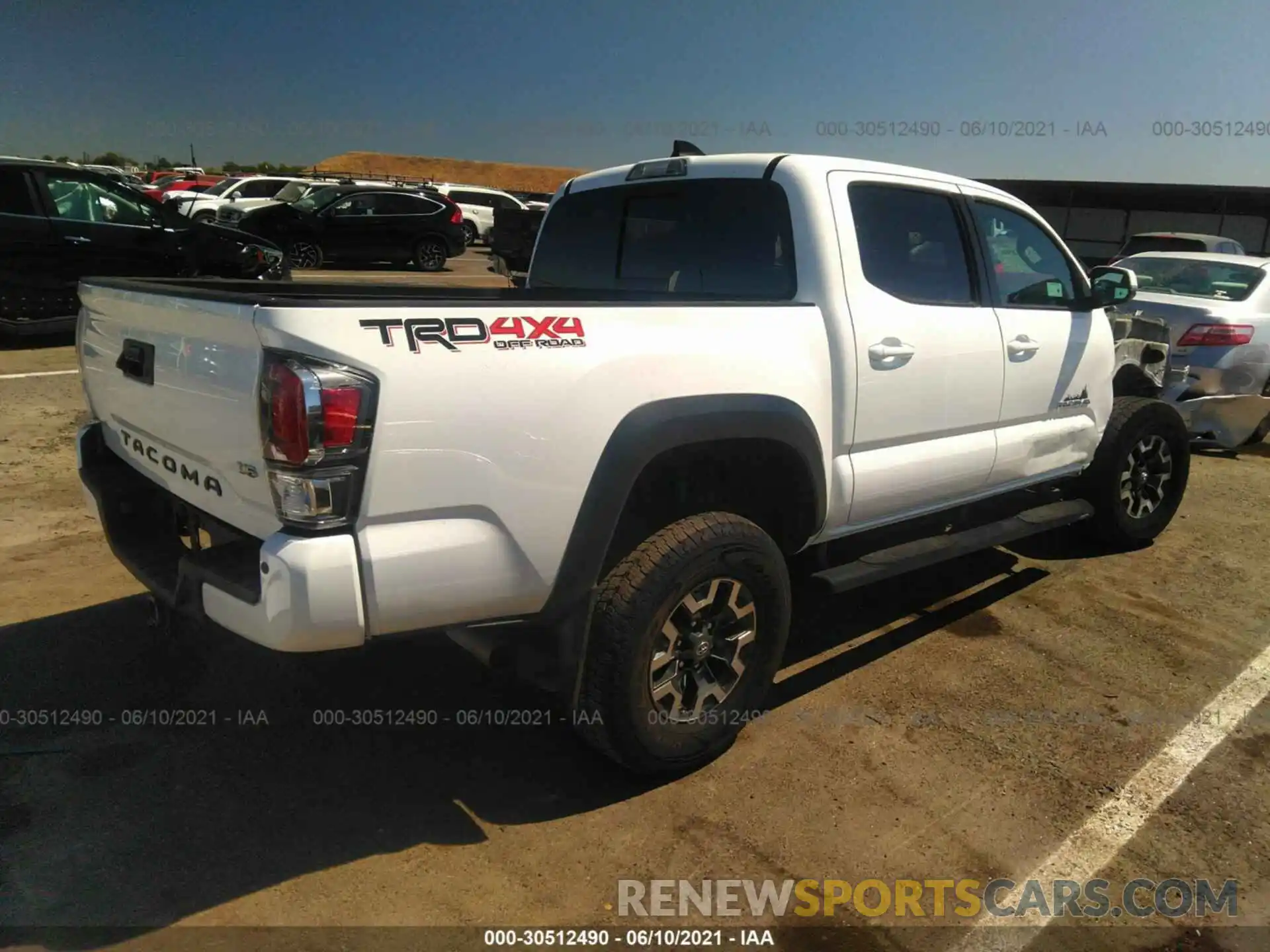 4 Photograph of a damaged car 3TMCZ5AN4LM291713 TOYOTA TACOMA 4WD 2020