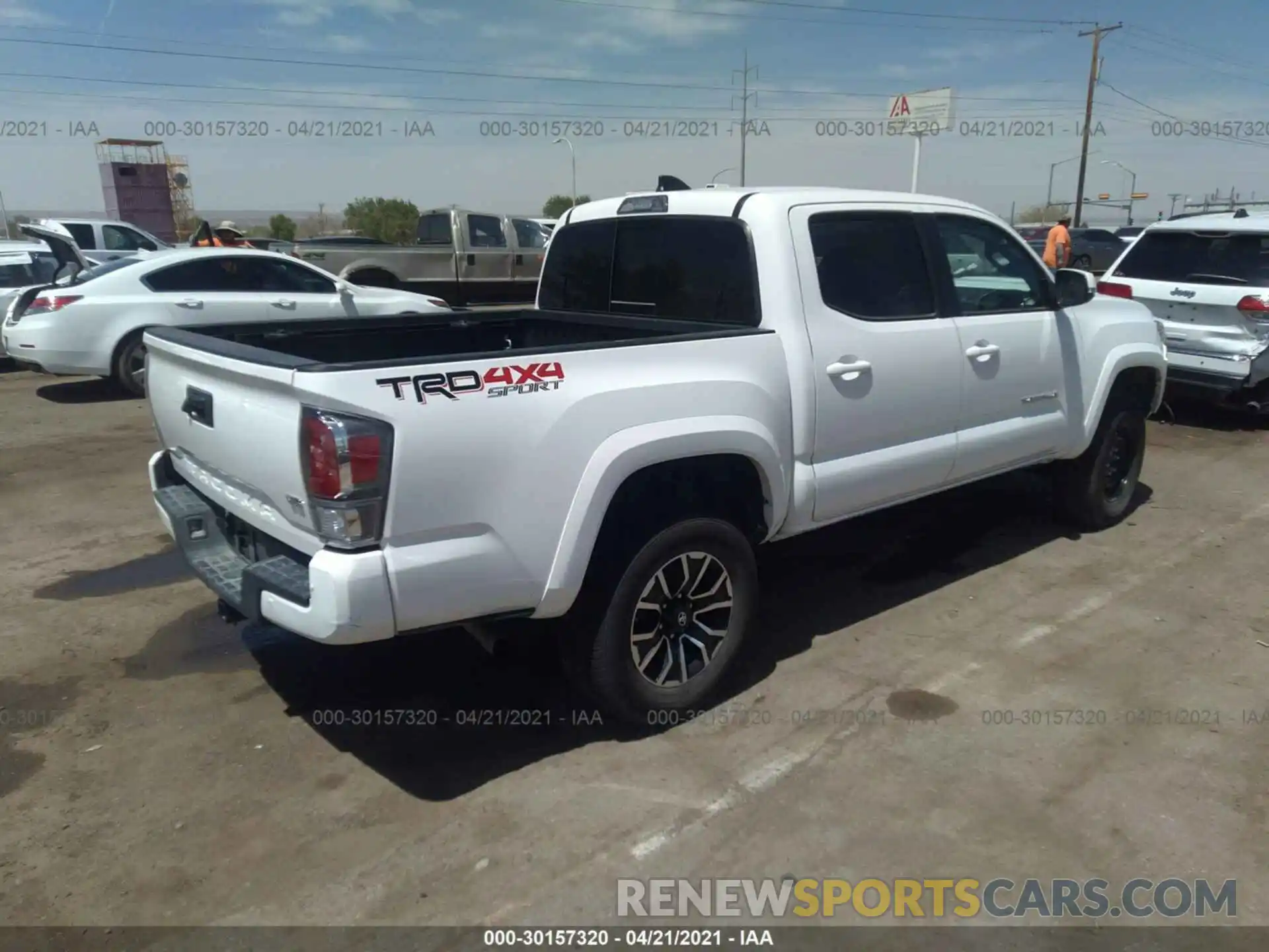 4 Photograph of a damaged car 3TMCZ5AN4LM329151 TOYOTA TACOMA 4WD 2020