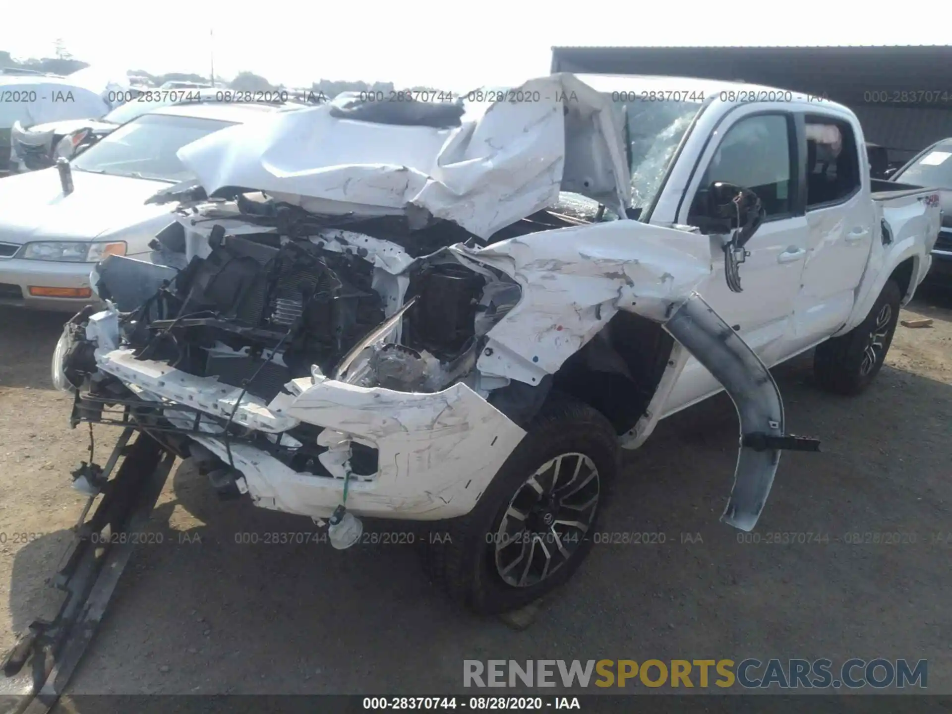 2 Photograph of a damaged car 3TMCZ5AN4LM333846 TOYOTA TACOMA 4WD 2020