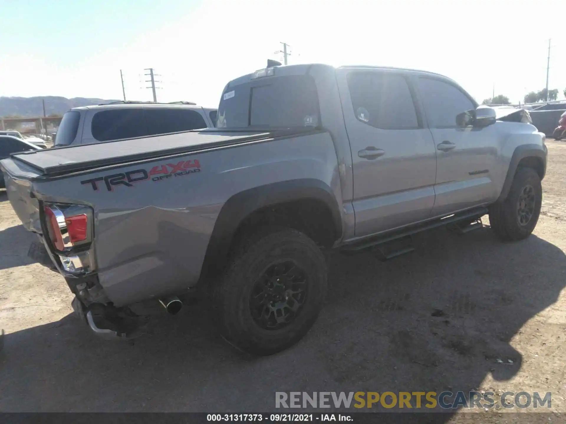 4 Photograph of a damaged car 3TMCZ5AN4LM353420 TOYOTA TACOMA 4WD 2020