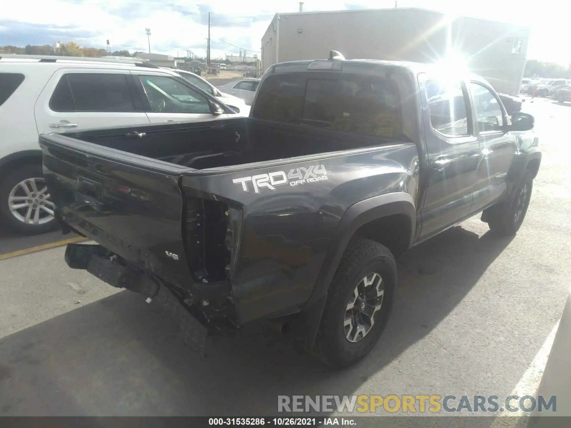 4 Photograph of a damaged car 3TMCZ5AN4LM354034 TOYOTA TACOMA 4WD 2020