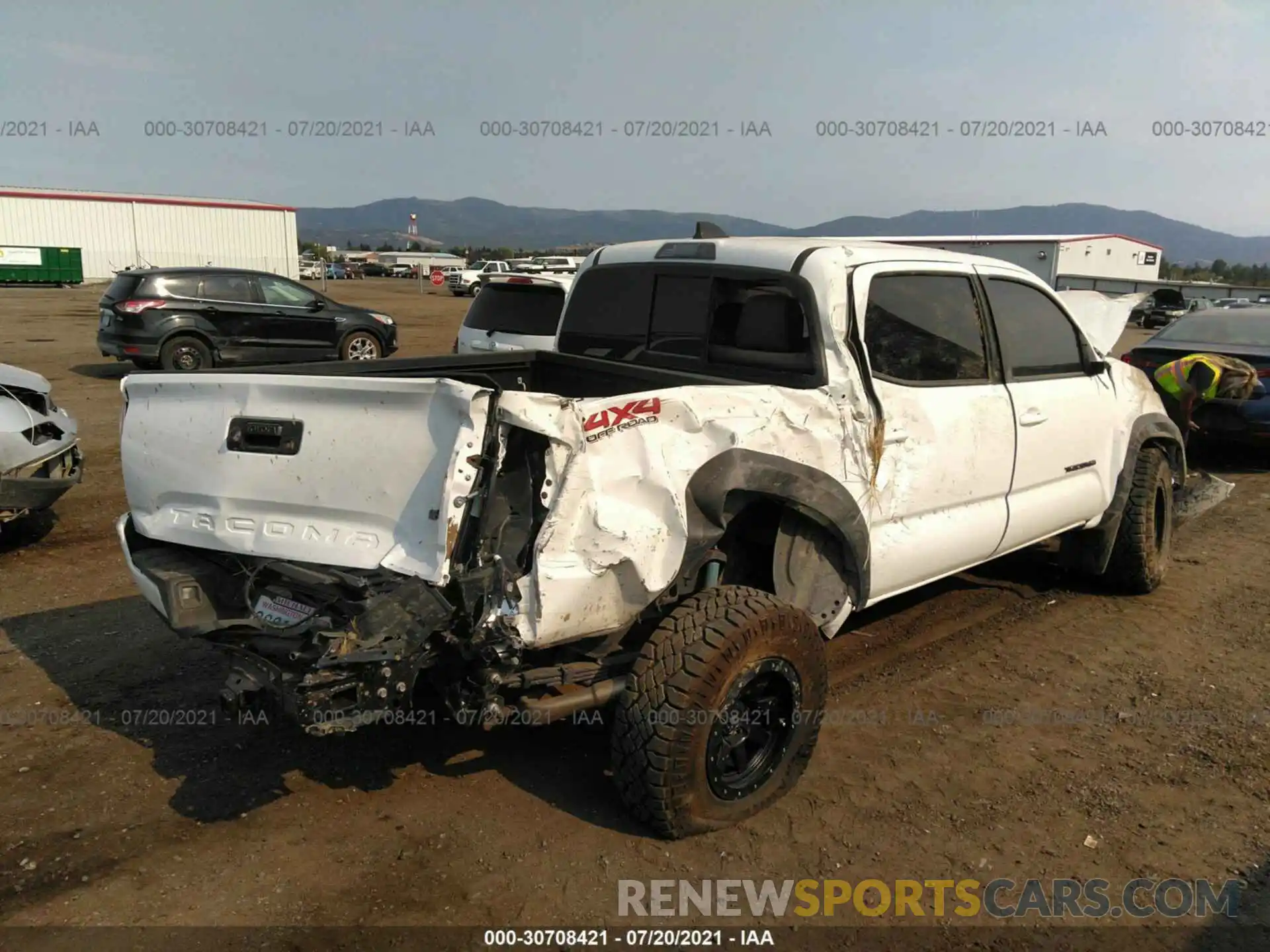 4 Photograph of a damaged car 3TMCZ5AN4LM362070 TOYOTA TACOMA 4WD 2020