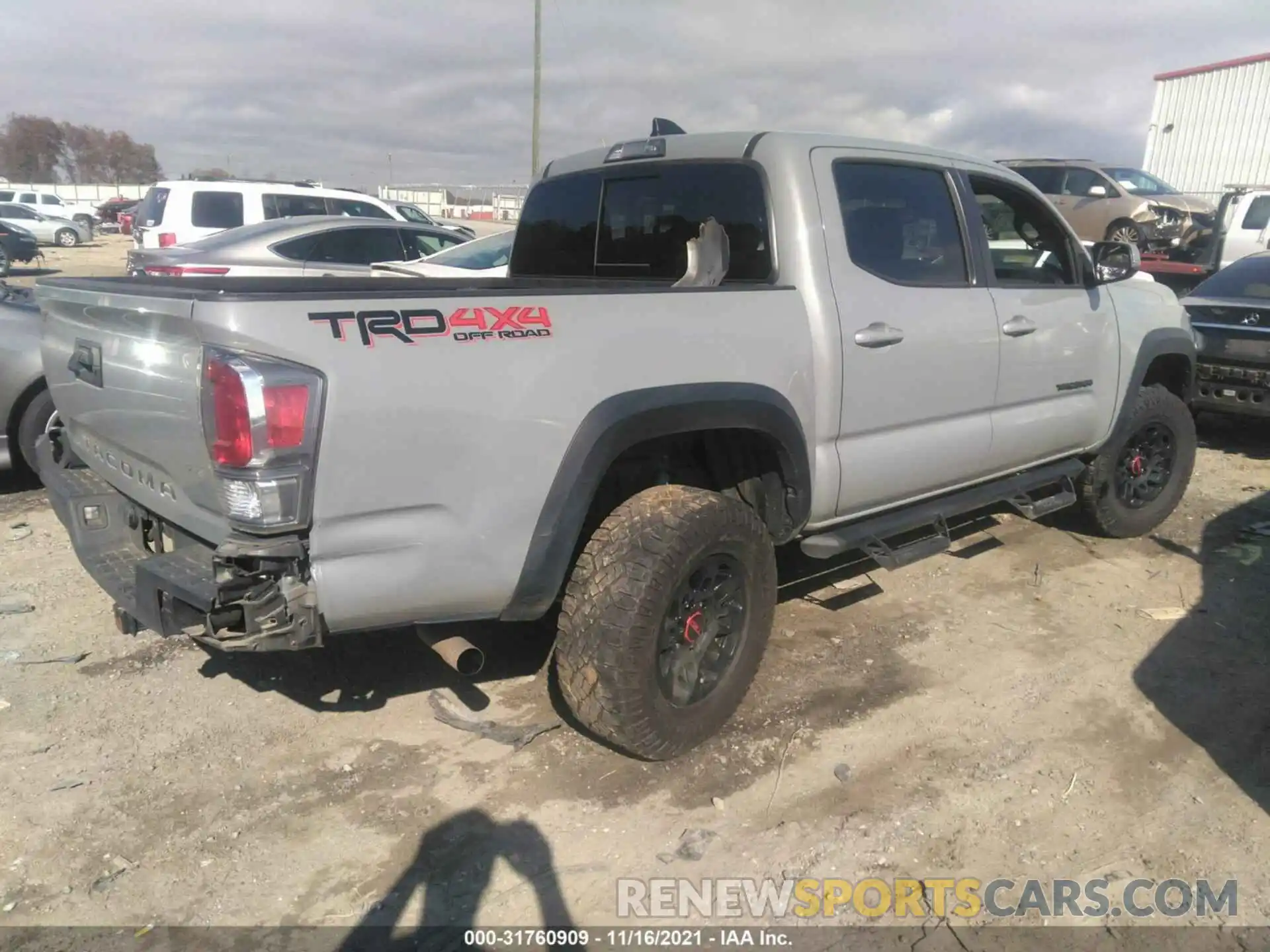 4 Photograph of a damaged car 3TMCZ5AN5LM291607 TOYOTA TACOMA 4WD 2020