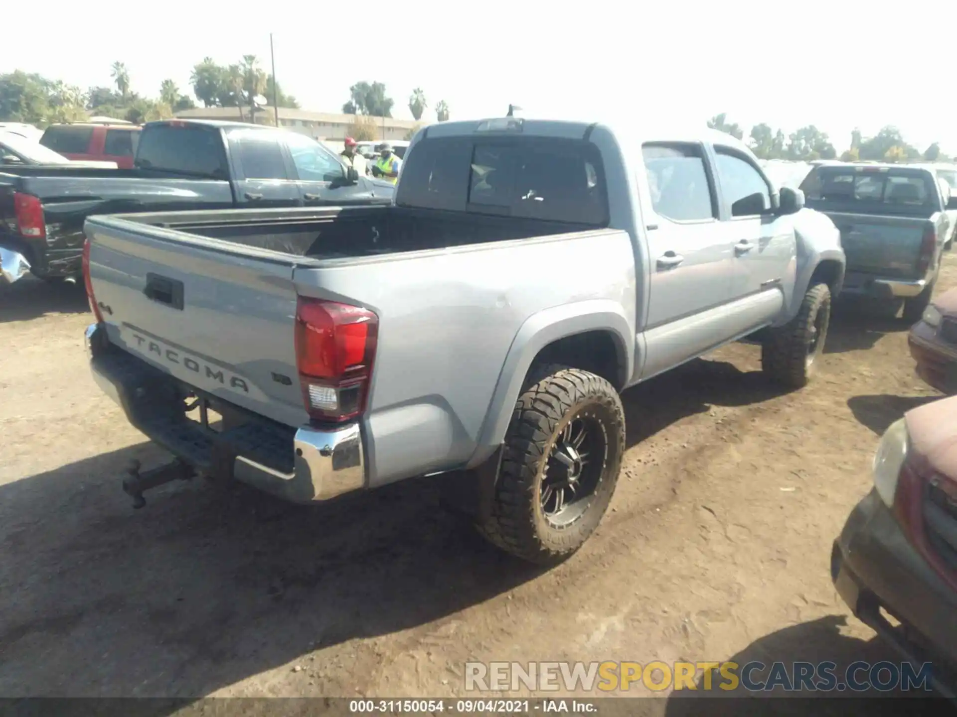 4 Photograph of a damaged car 3TMCZ5AN5LM305070 TOYOTA TACOMA 4WD 2020