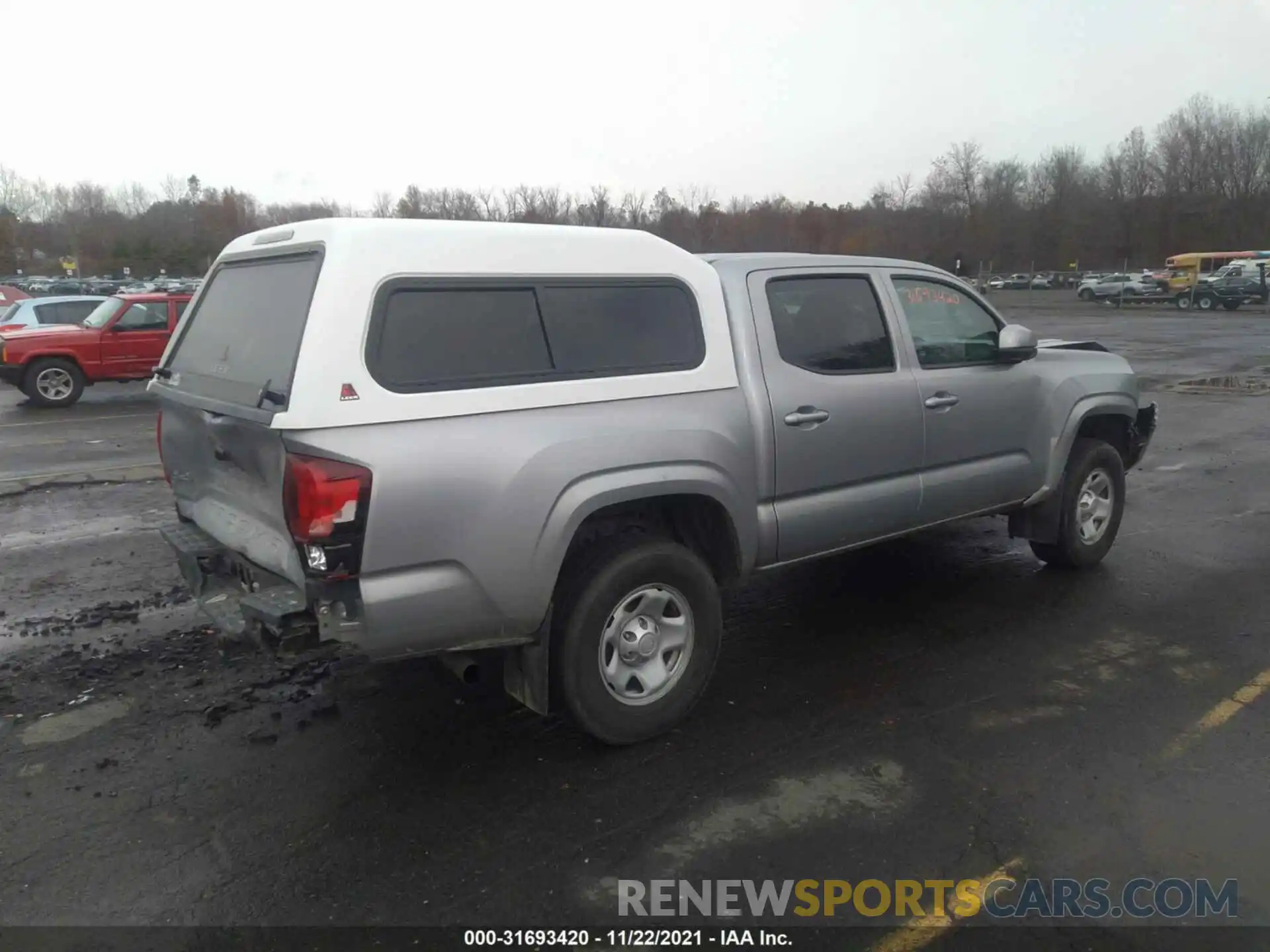 4 Photograph of a damaged car 3TMCZ5AN5LM329305 TOYOTA TACOMA 4WD 2020